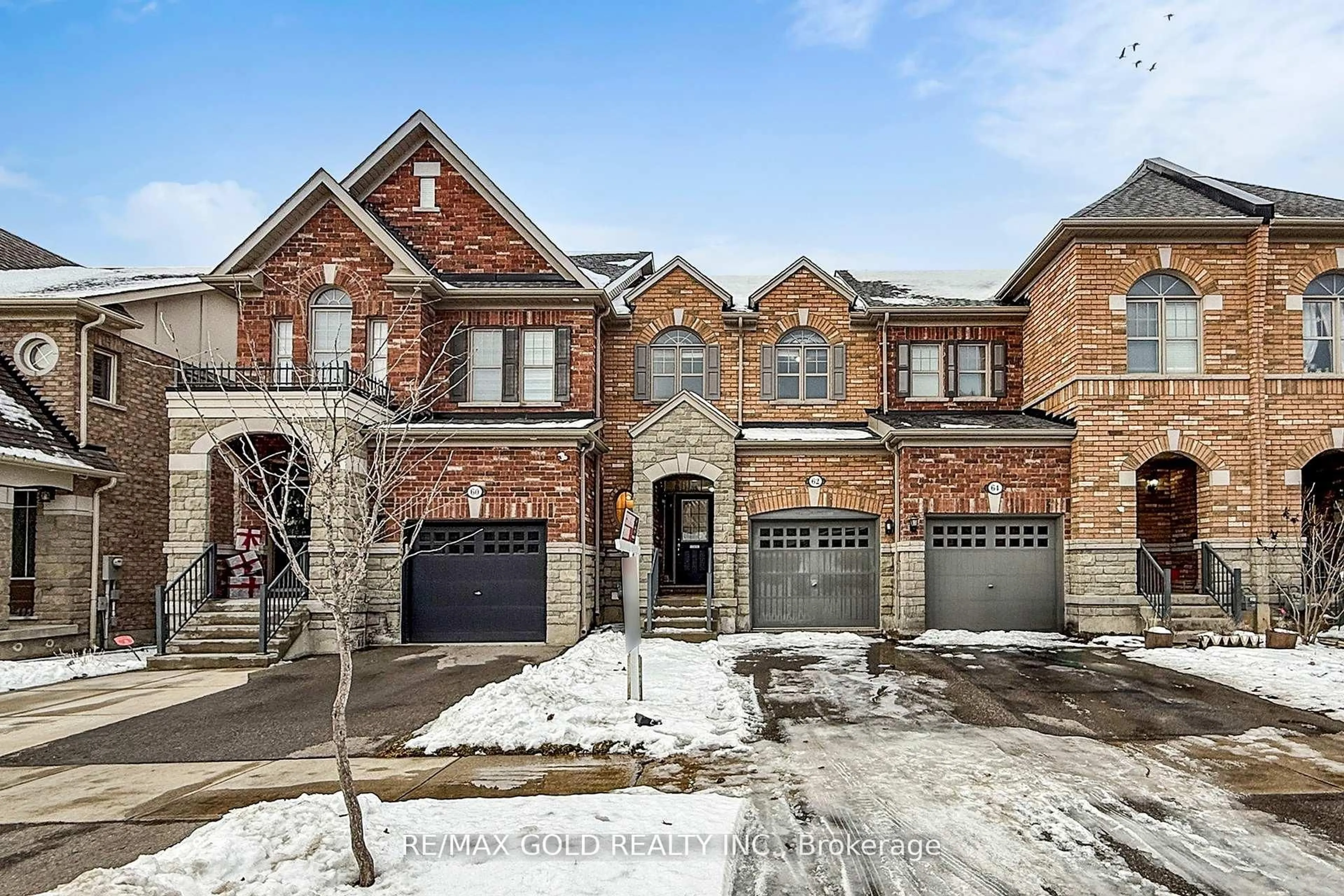 Home with brick exterior material, street for 62 Pennycross Cres, Brampton Ontario L7A 4M1