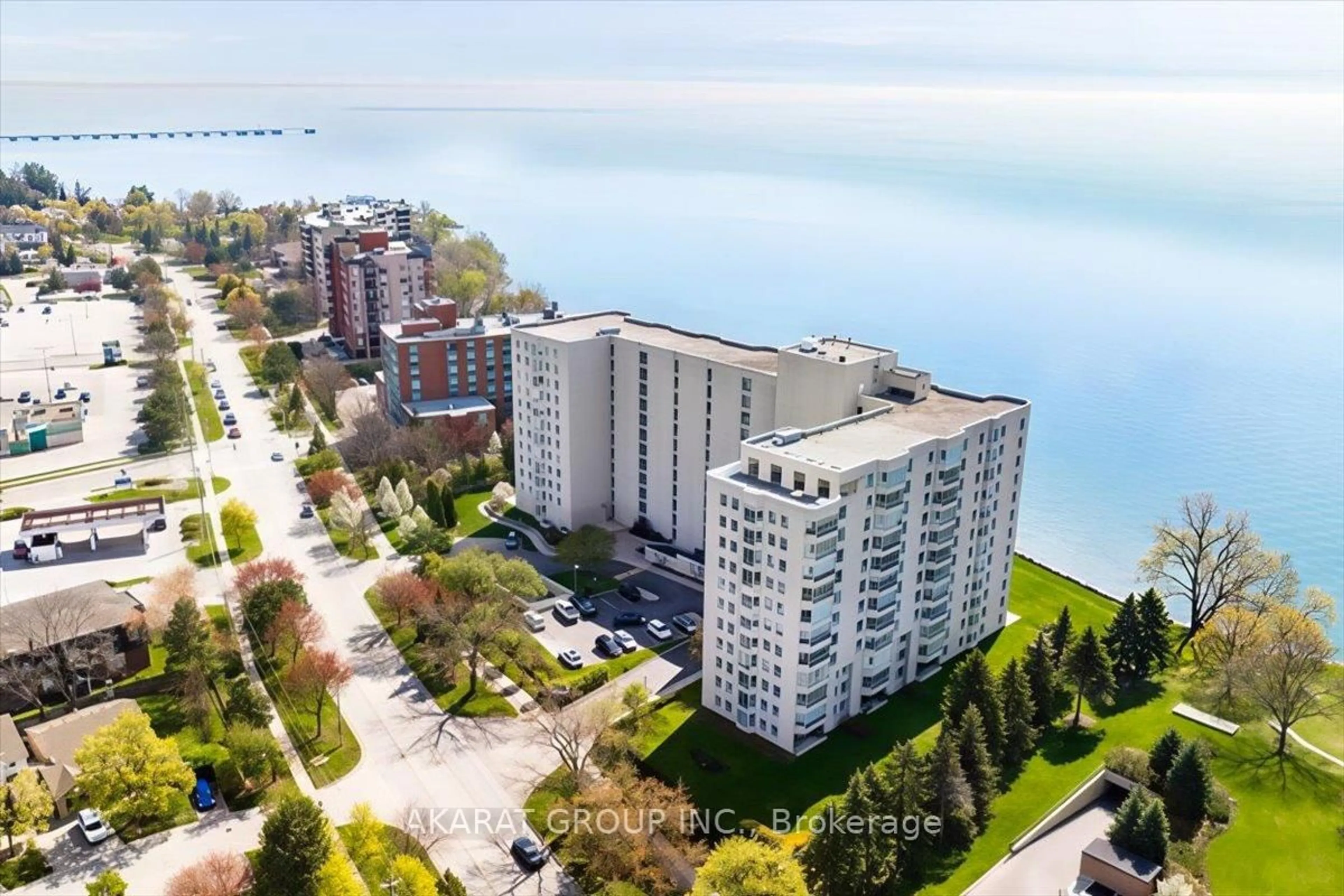 A pic from outside/outdoor area/front of a property/back of a property/a pic from drone, water/lake/river/ocean view for 5280 Lakeshore Rd #911, Burlington Ontario L7L 5R1