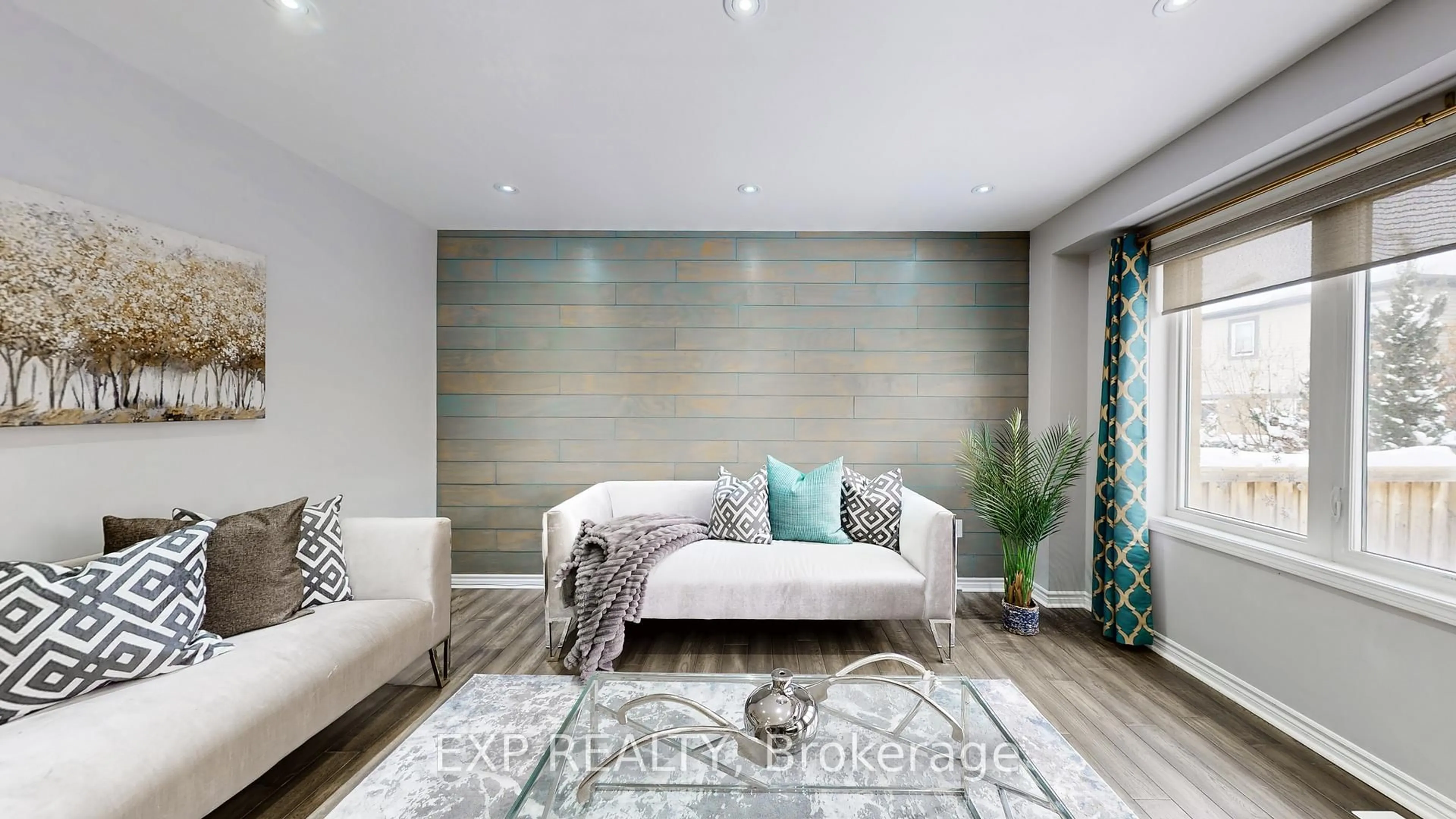 Living room with furniture, wood/laminate floor for 27 Leadenhall Rd, Brampton Ontario L7A 4G3