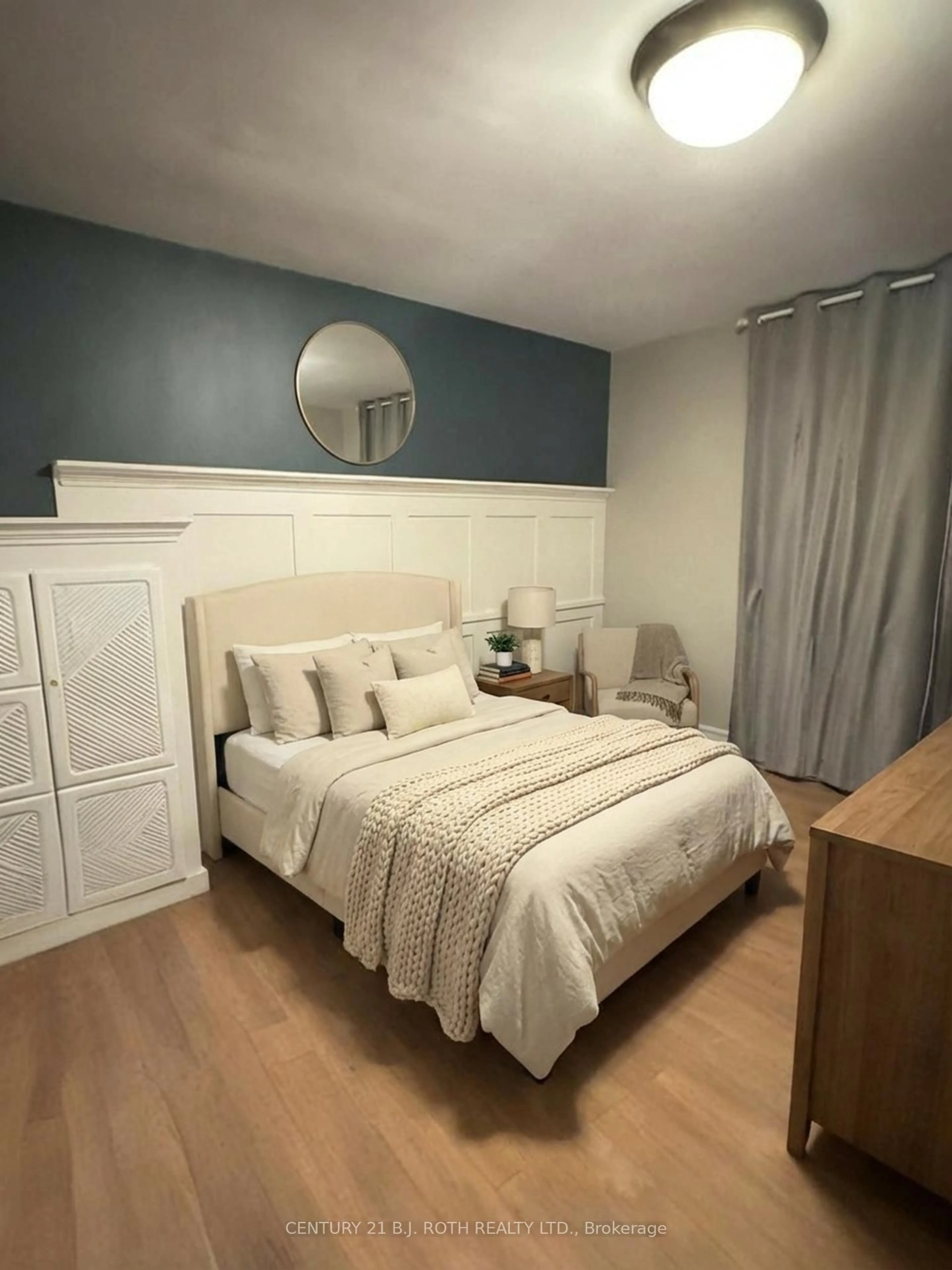 Bedroom with bed, wood/laminate floor for 50 Gulliver Rd #508, Toronto Ontario M6M 2N2