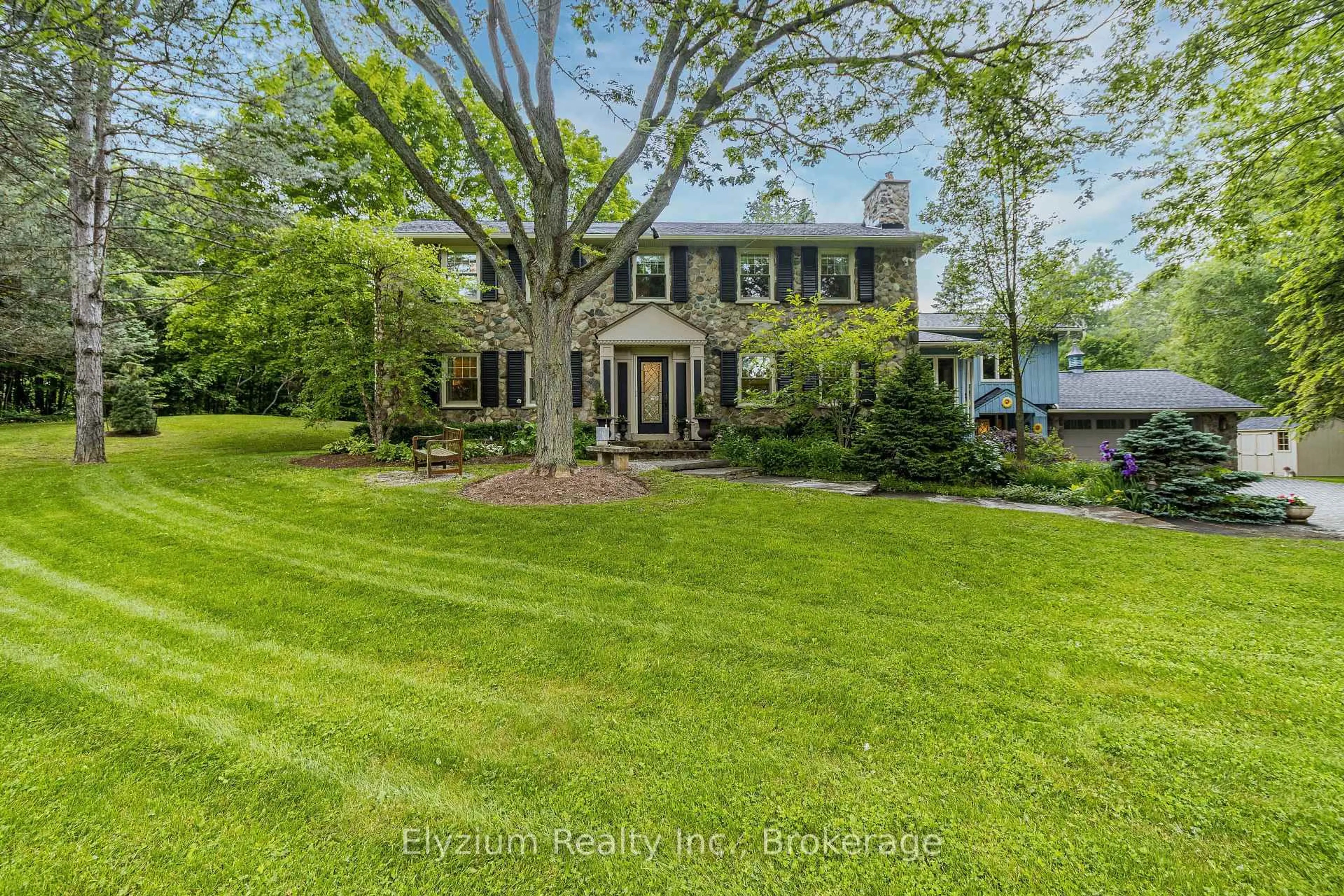 A pic from outside/outdoor area/front of a property/back of a property/a pic from drone, water/lake/river/ocean view for 27 Cedar Dr, Caledon Ontario L7K 1H5