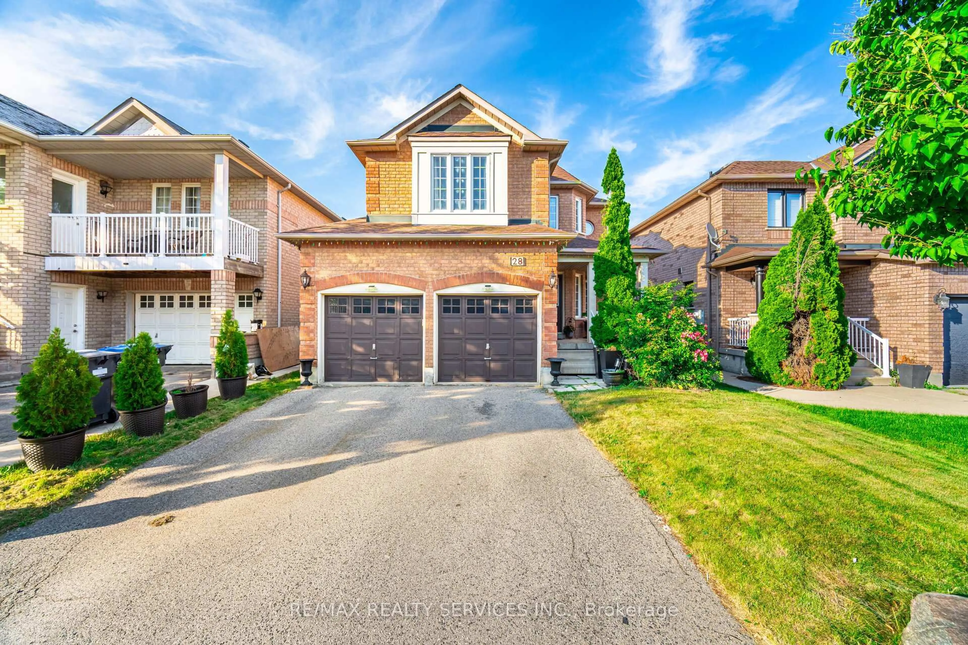 Home with brick exterior material, street for 28 Fallstar Cres, Brampton Ontario L7A 2J6