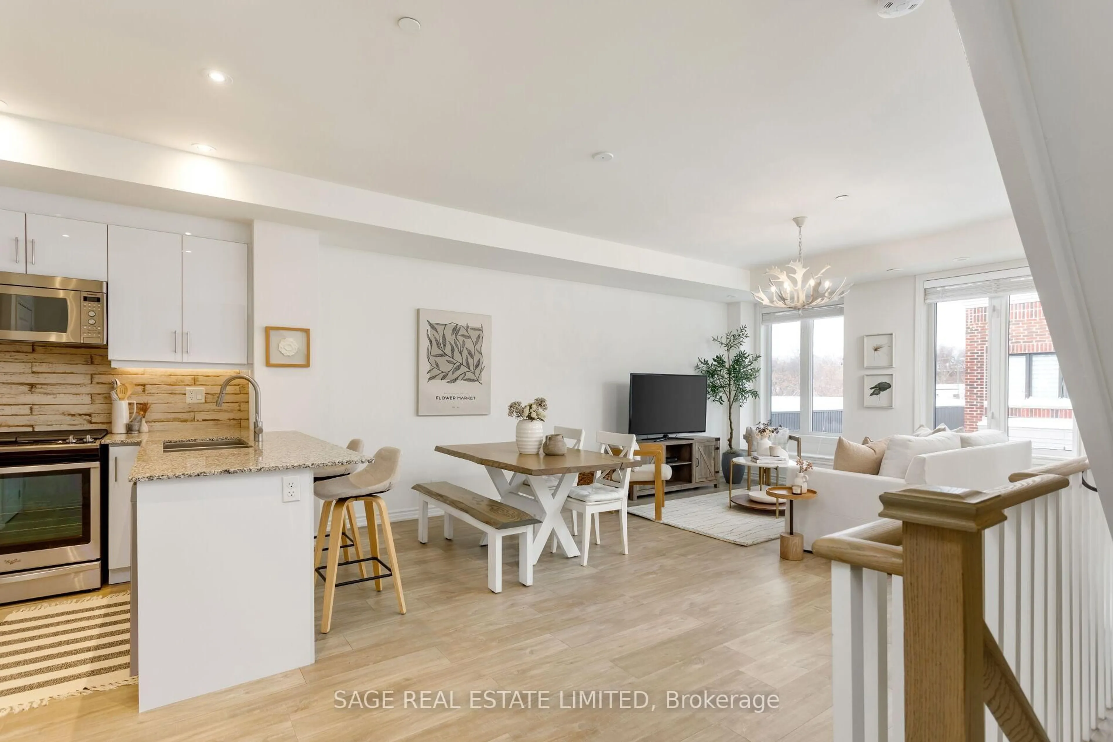 Open concept kitchen, wood/laminate floor for 90 Eastwood Park Gdns #2, Toronto Ontario M8W 0B2