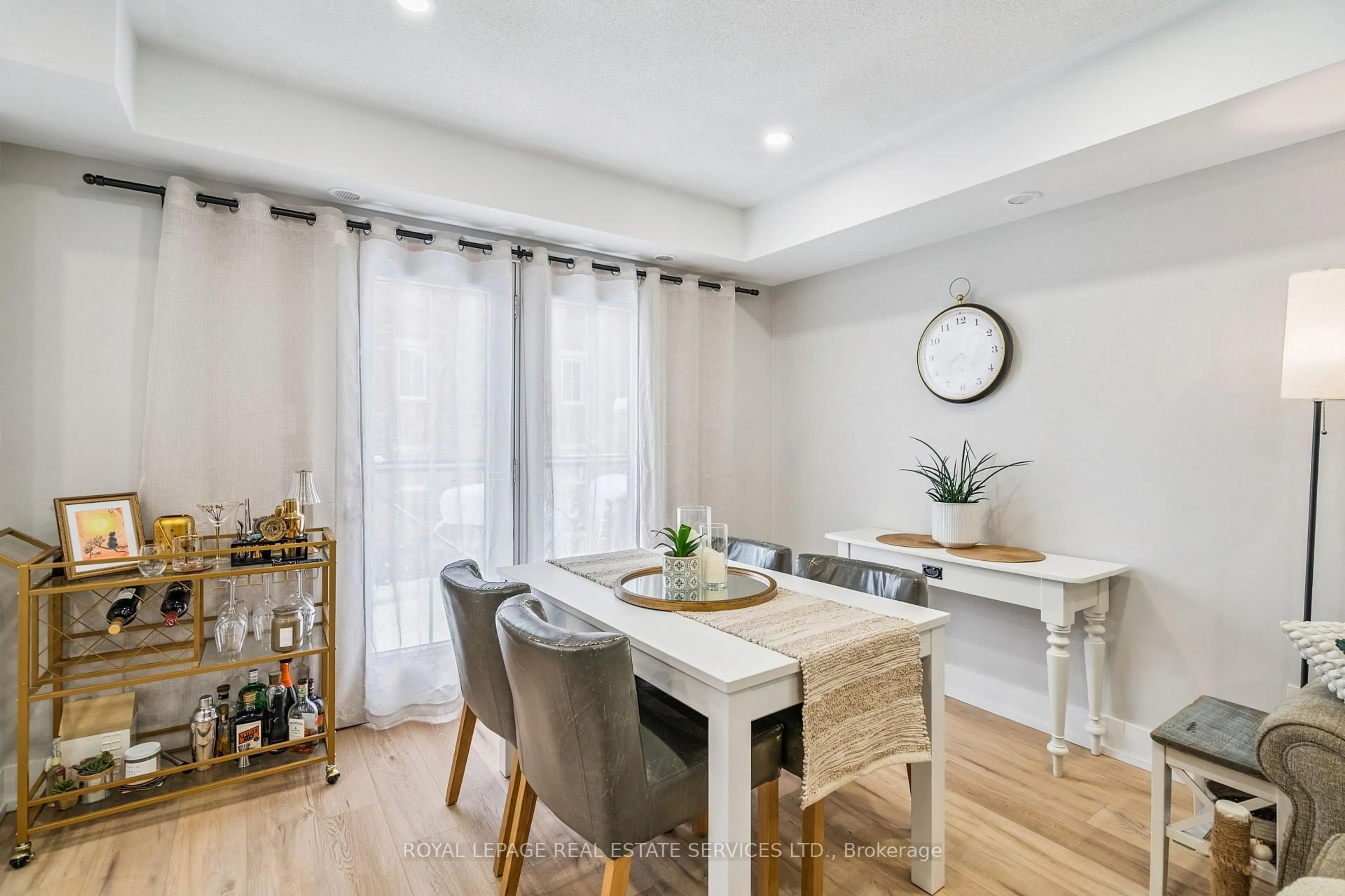 Dining room, wood/laminate floor for 2444 Post Rd #9, Oakville Ontario L6H 0J2