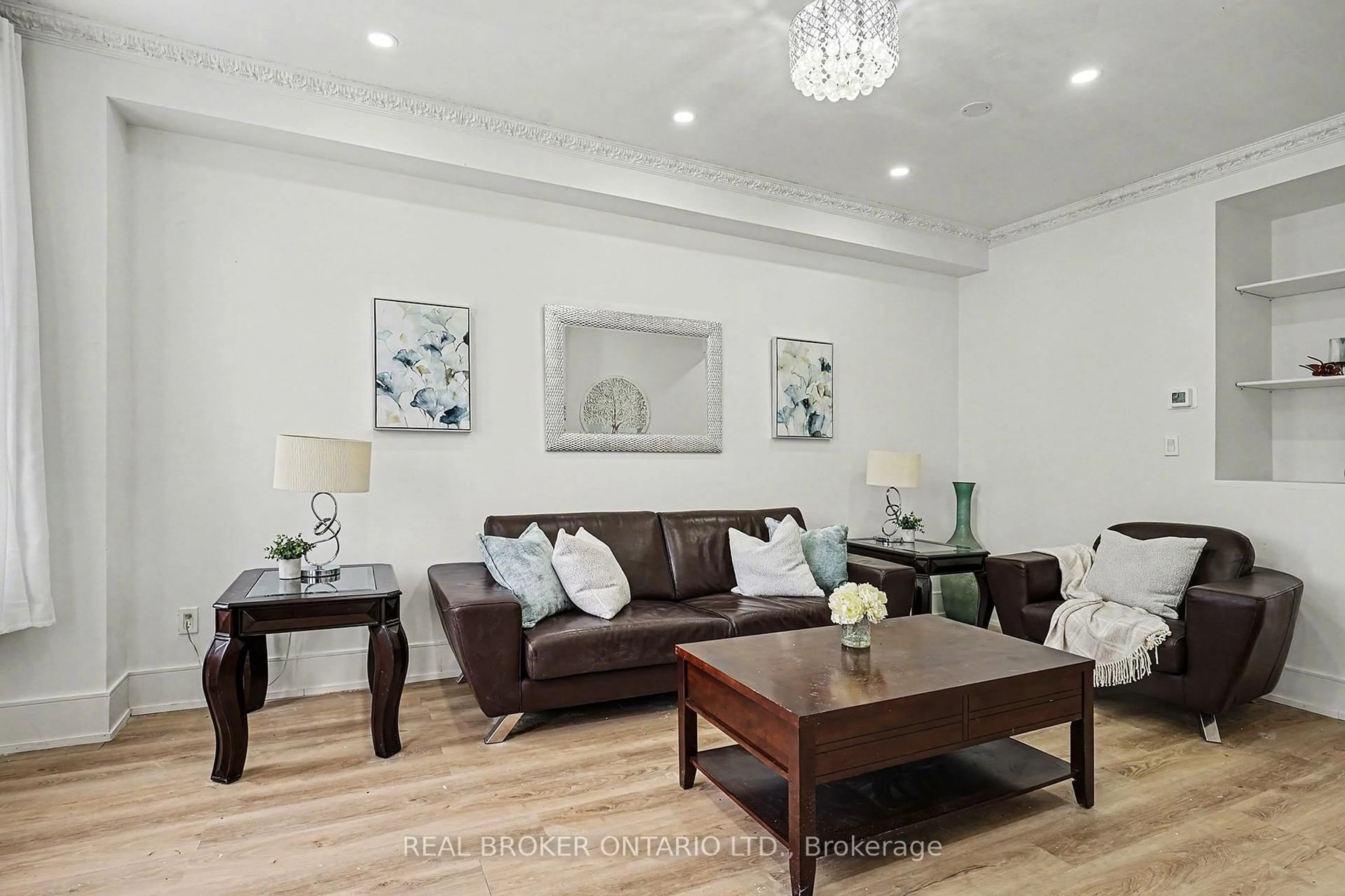 Living room with furniture, wood/laminate floor for 16 Leitch Ave, Toronto Ontario M3J 3P2