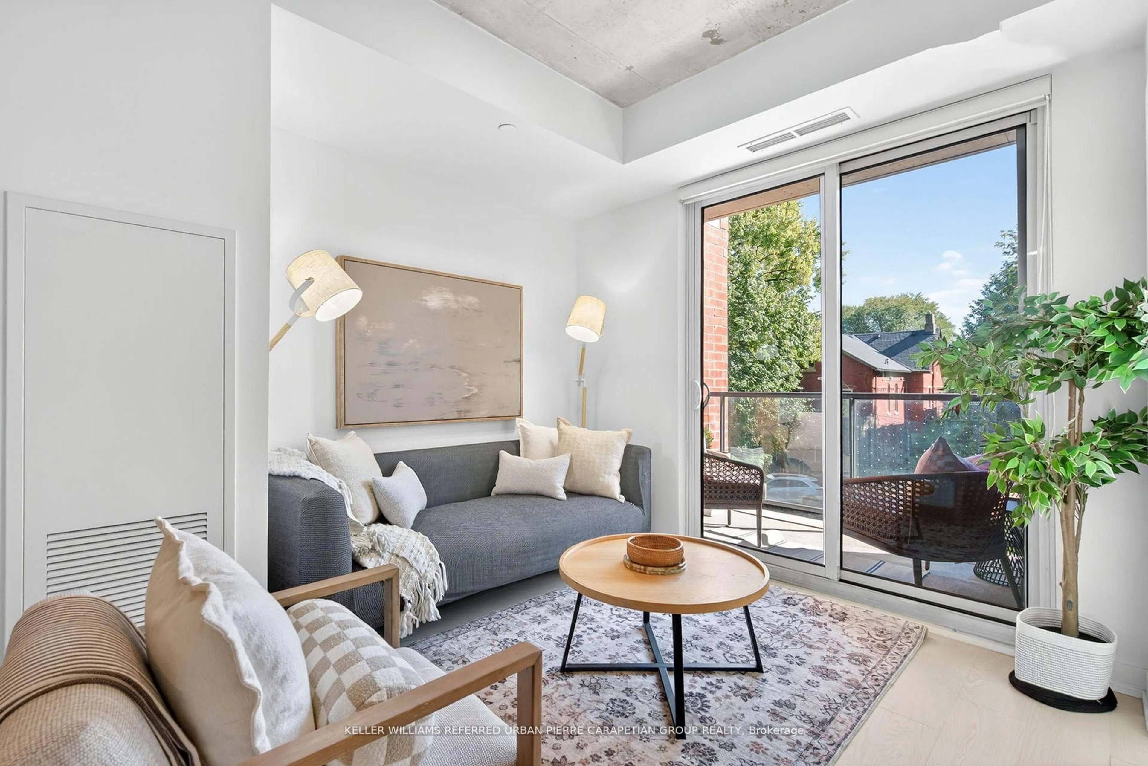 Living room with furniture, unknown for 57 Brock Ave #215, Toronto Ontario M3H 3N2