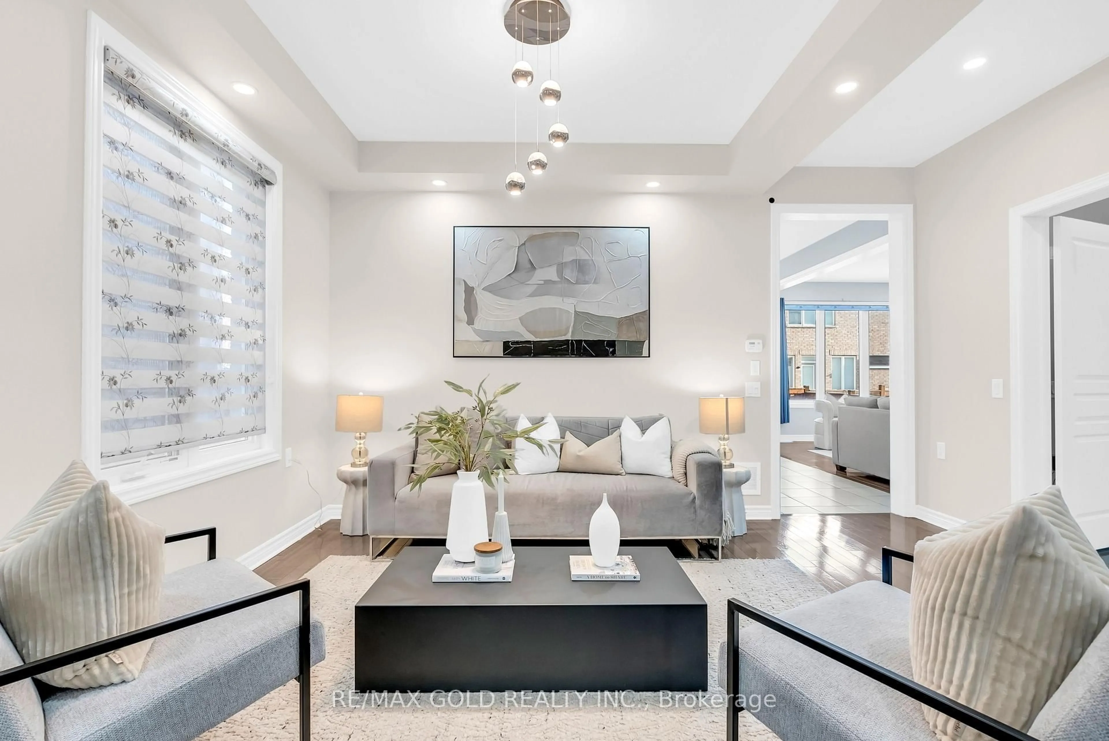 Living room with furniture, ceramic/tile floor for 25 Newhouse Blvd, Caledon Ontario L7C 4A2