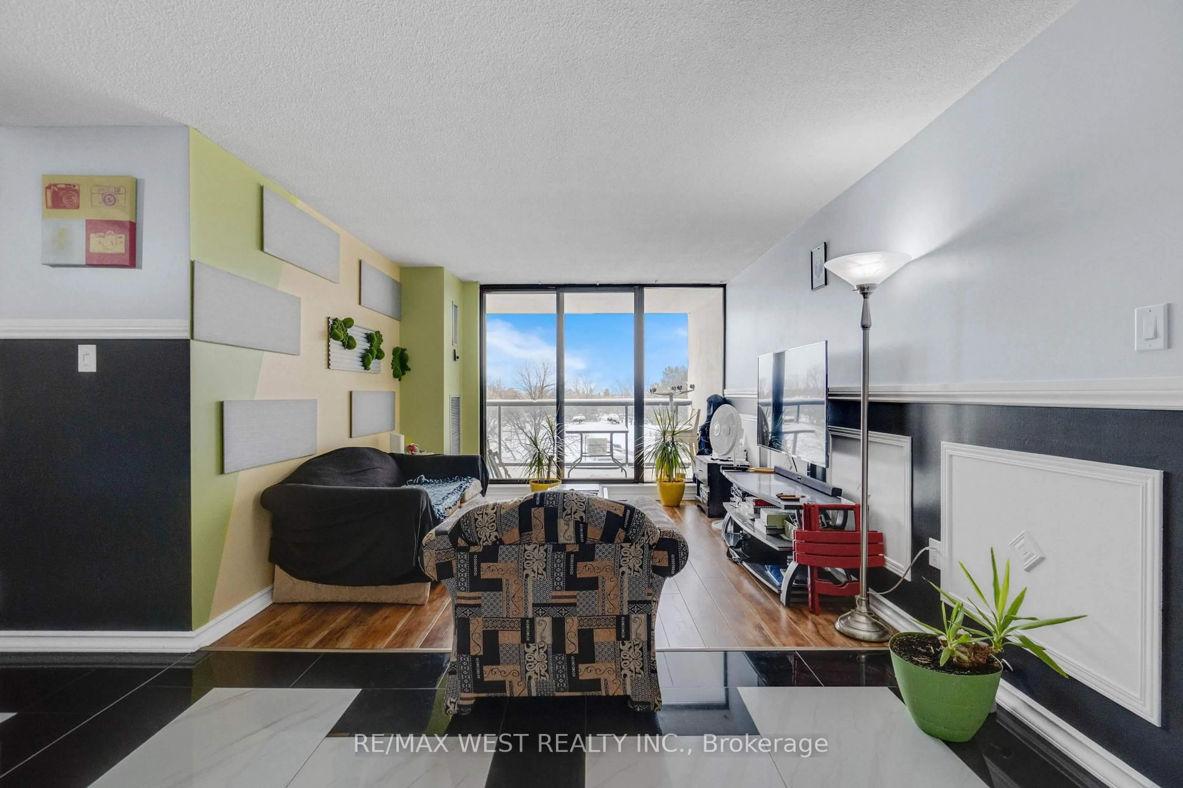 Living room with furniture, unknown for 21 Knightsbridge Rd #407, Brampton Ontario L6T 3Y1