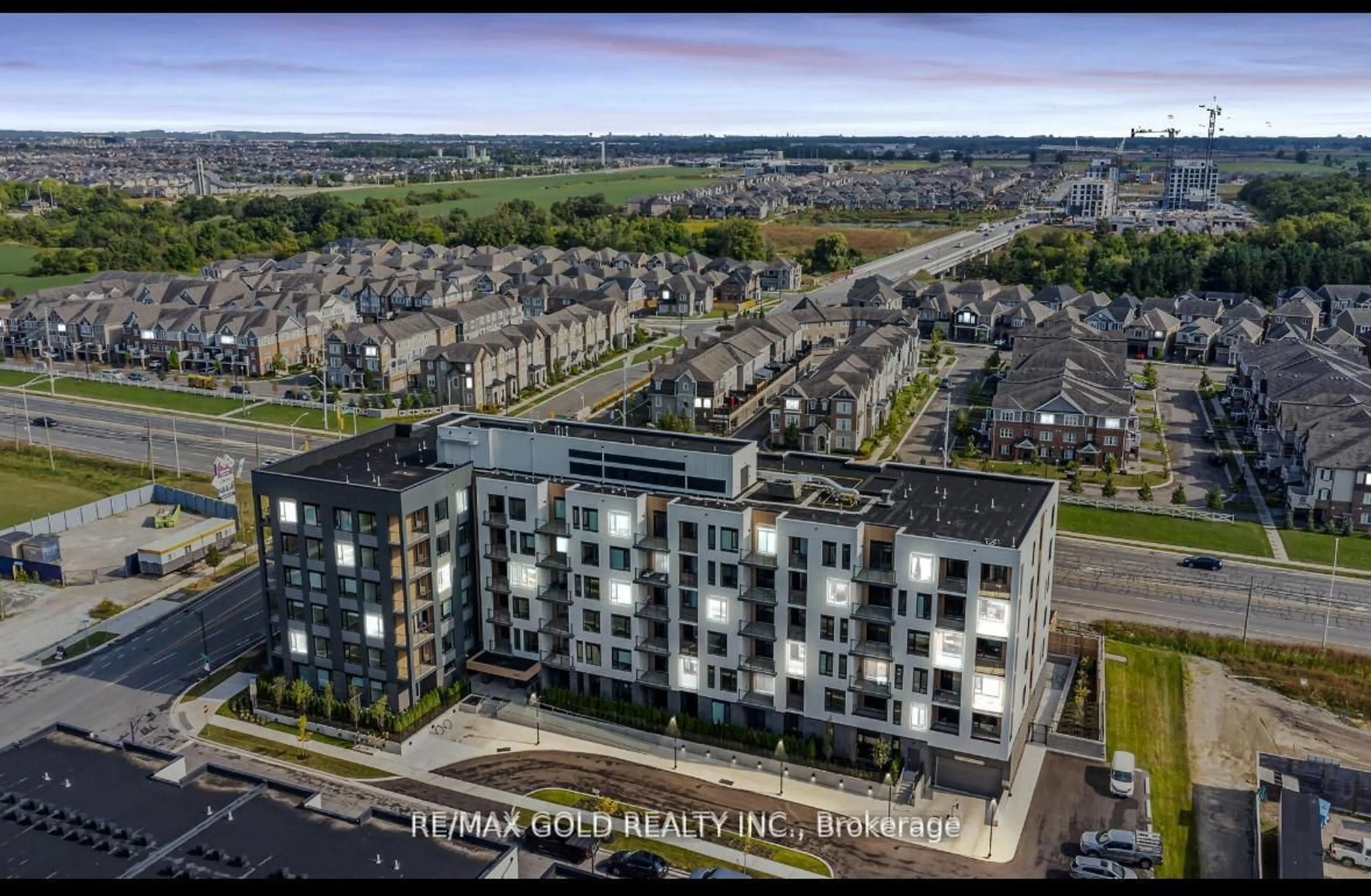 A pic from outside/outdoor area/front of a property/back of a property/a pic from drone, city buildings view from balcony for 1440 Clarriage Crt #211, Milton Ontario L9E 1B3