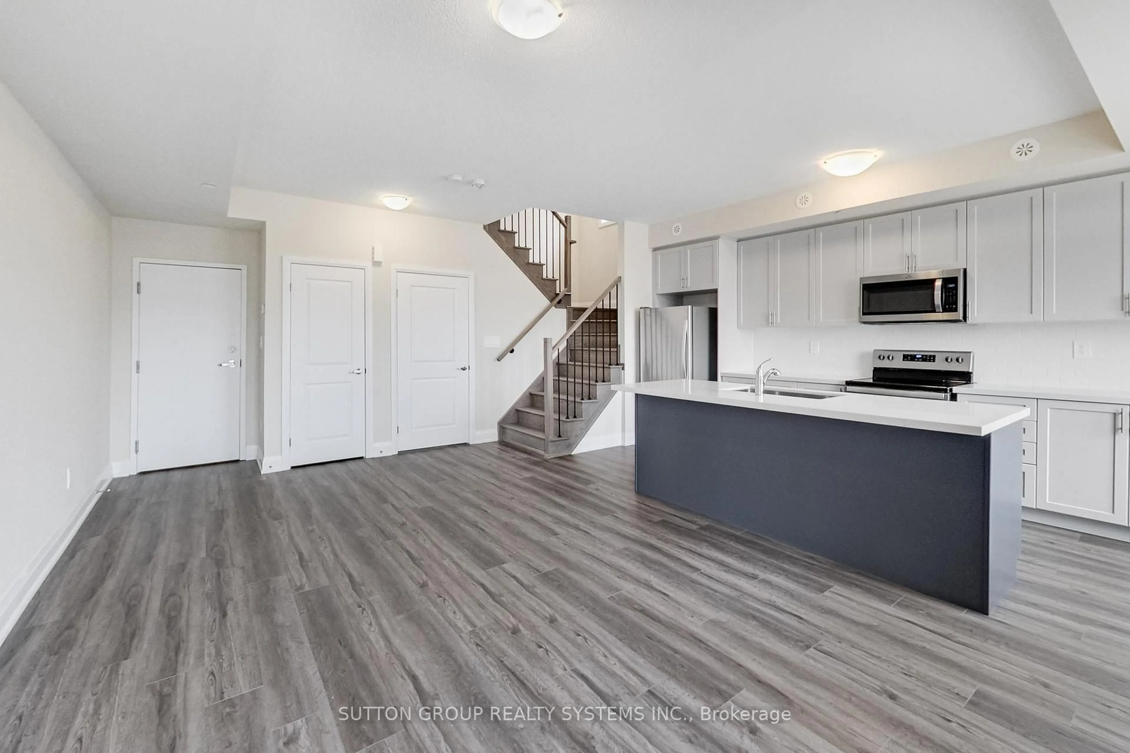 Open concept kitchen, unknown for 1577 Rose Way #103, Milton Ontario L9E 0J2