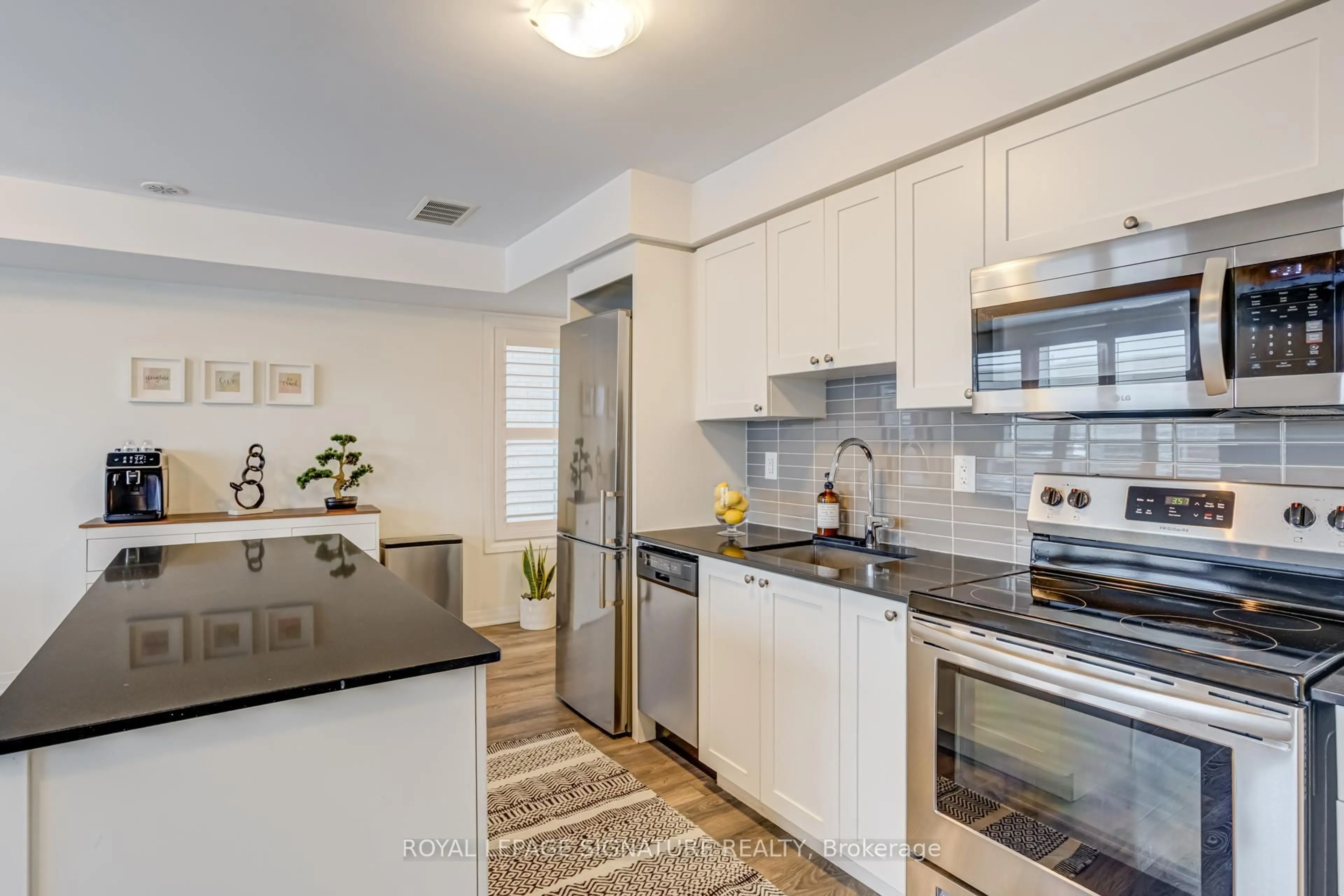 Open concept kitchen, ceramic/tile floor for 179 William Duncan Rd #4, Toronto Ontario M3K 0B7