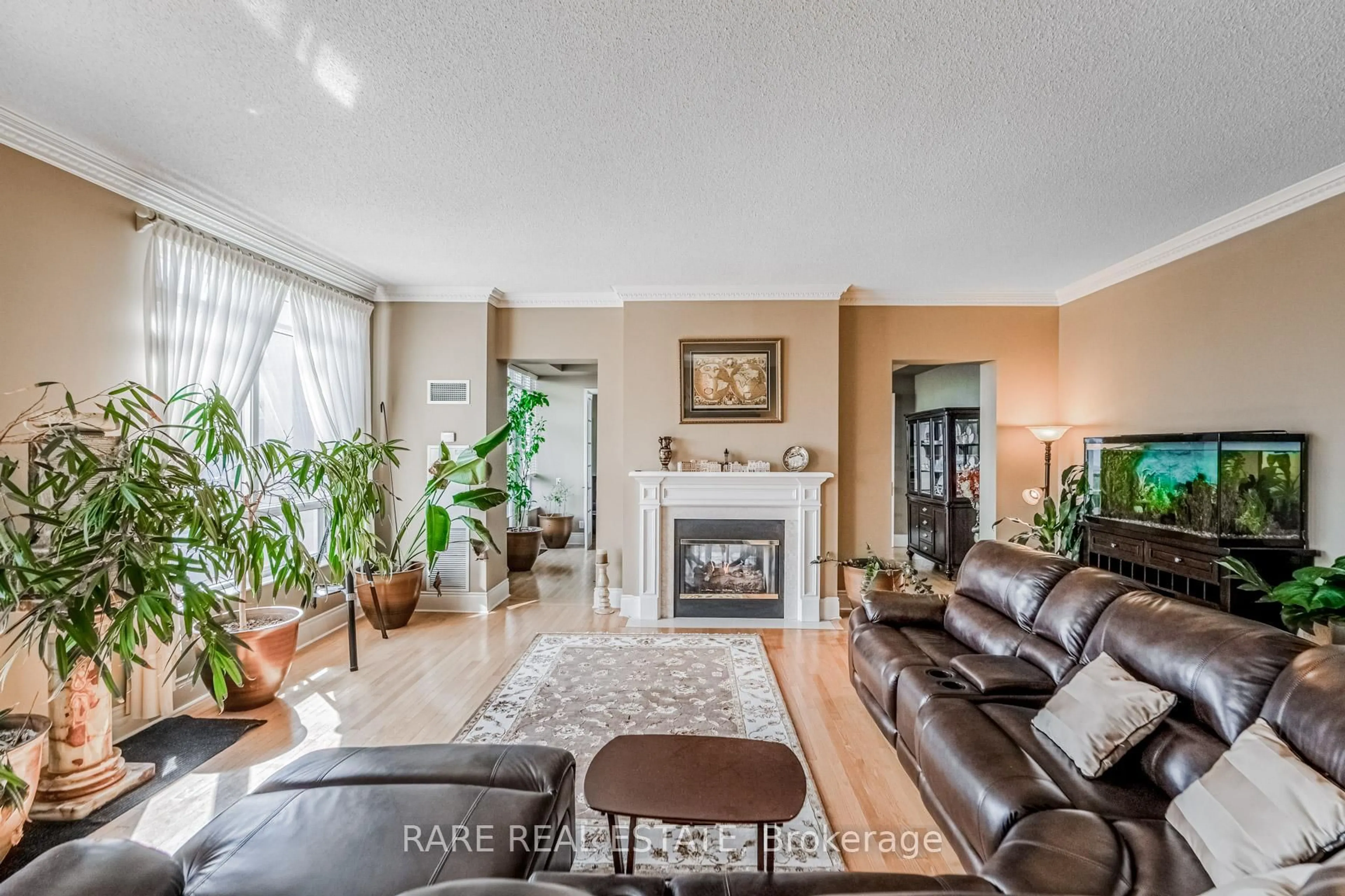 Living room with furniture, unknown for 25 Kingsbridge Garden Circ #TPH6, Mississauga Ontario L5R 4B1