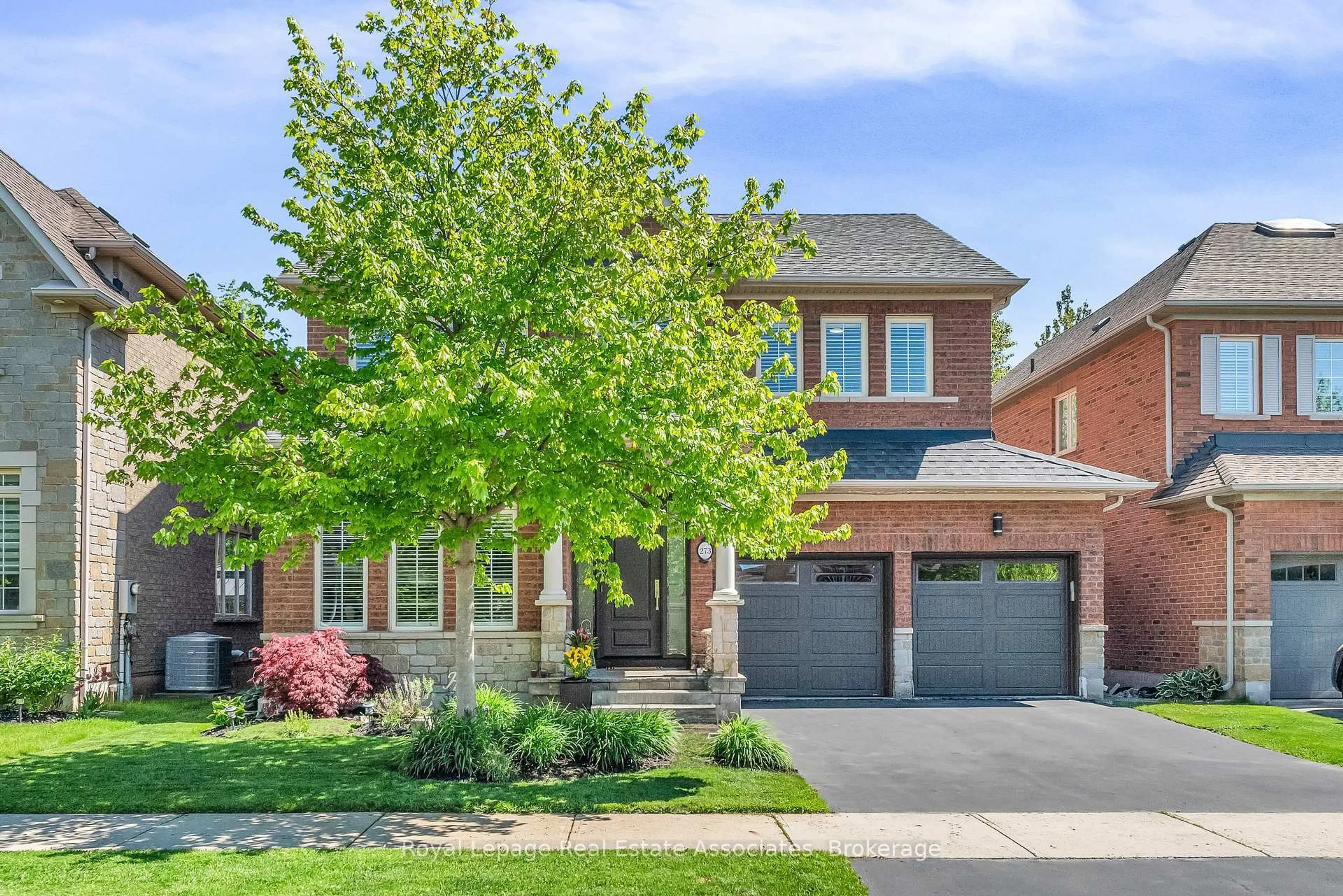 Home with brick exterior material, street for 273 Duskywing Way, Oakville Ontario L6L 6X5