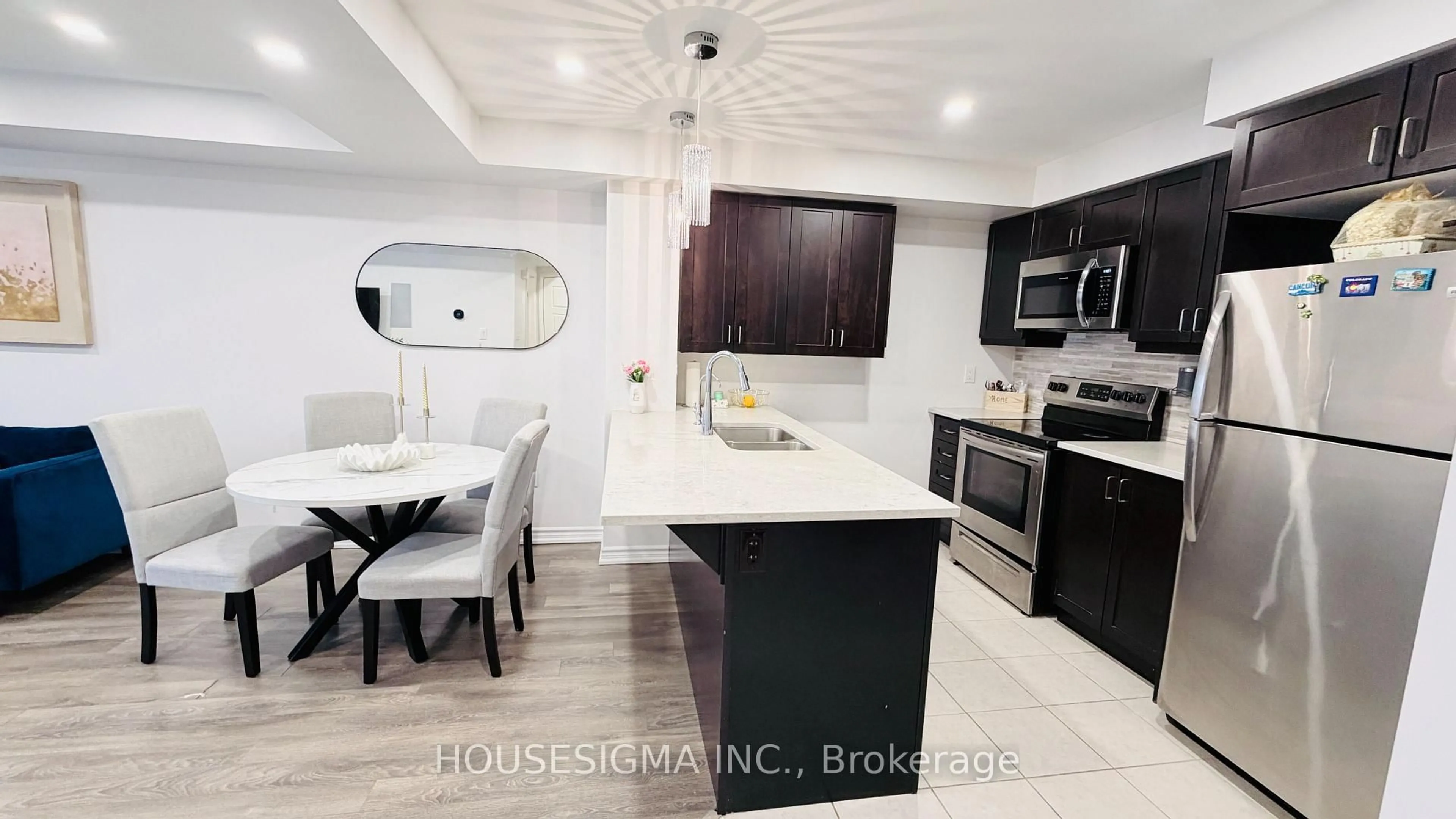 Open concept kitchen, ceramic/tile floor for 1222 Rose Way #50, Milton Ontario L9E 1P1