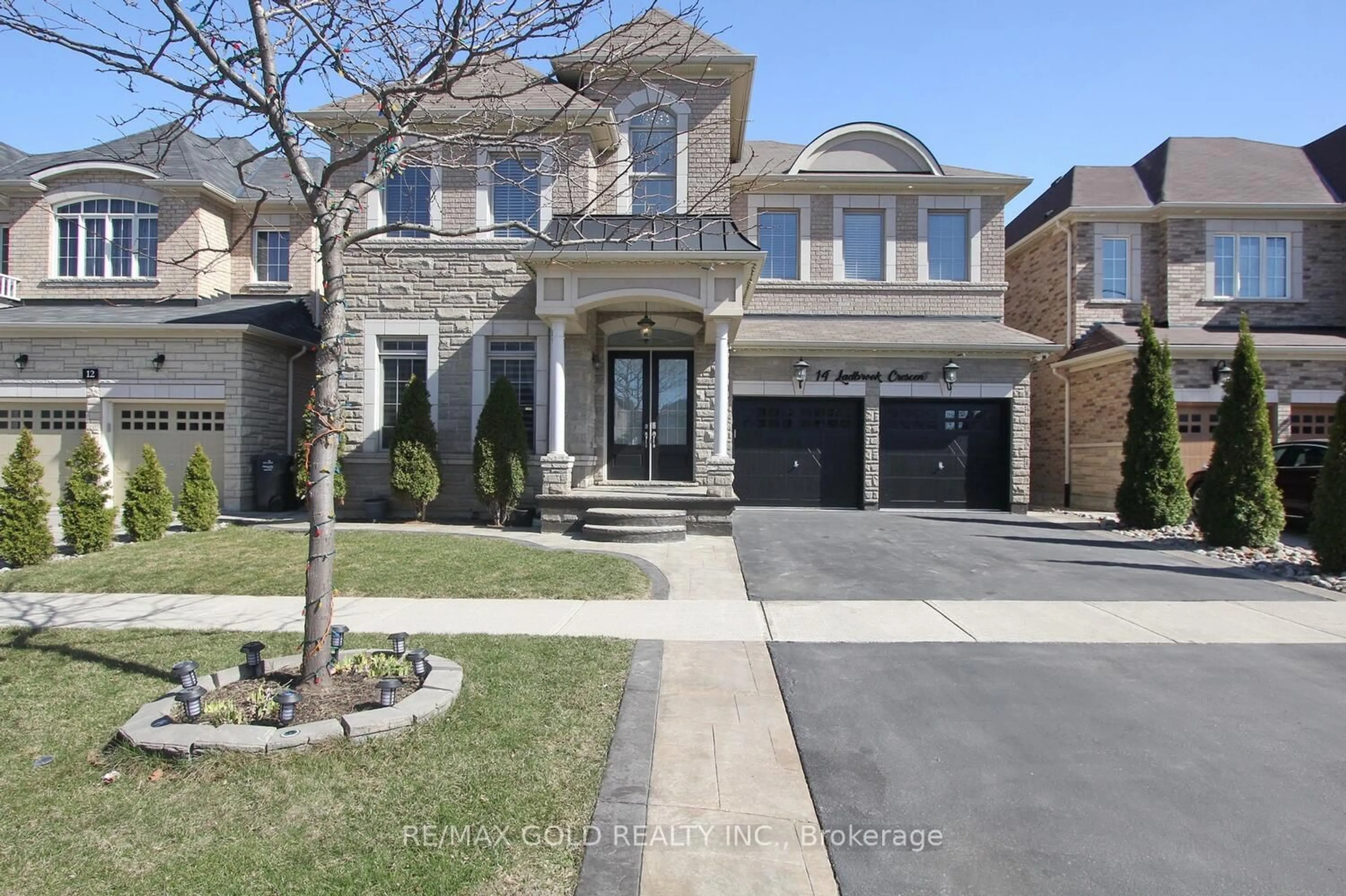 Home with brick exterior material, street for 14 Ladbrook Cres, Brampton Ontario L6X 5H6