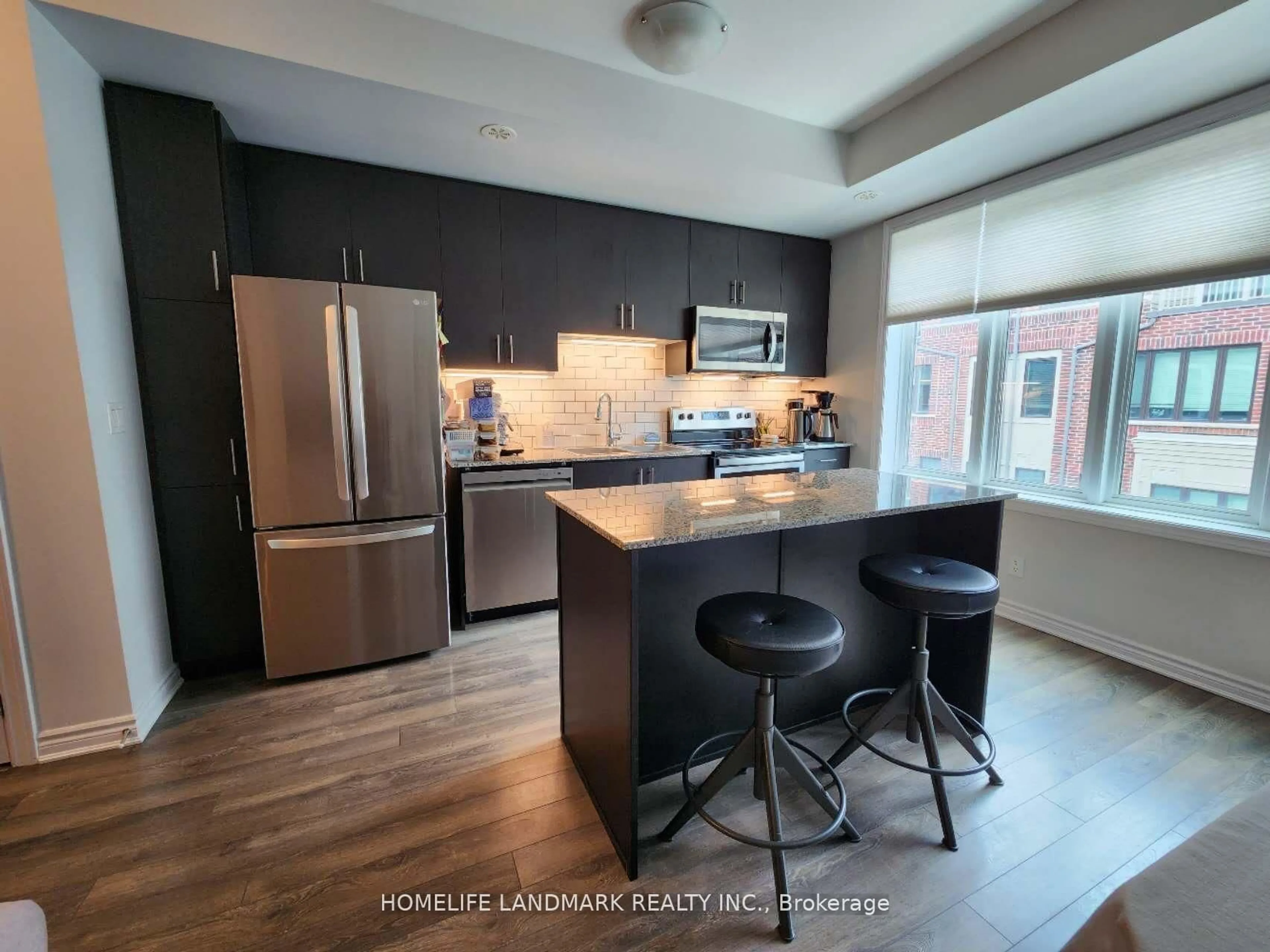 Open concept kitchen, unknown for 95 Eastwood Park Gdns #27, Toronto Ontario M8W 0B9