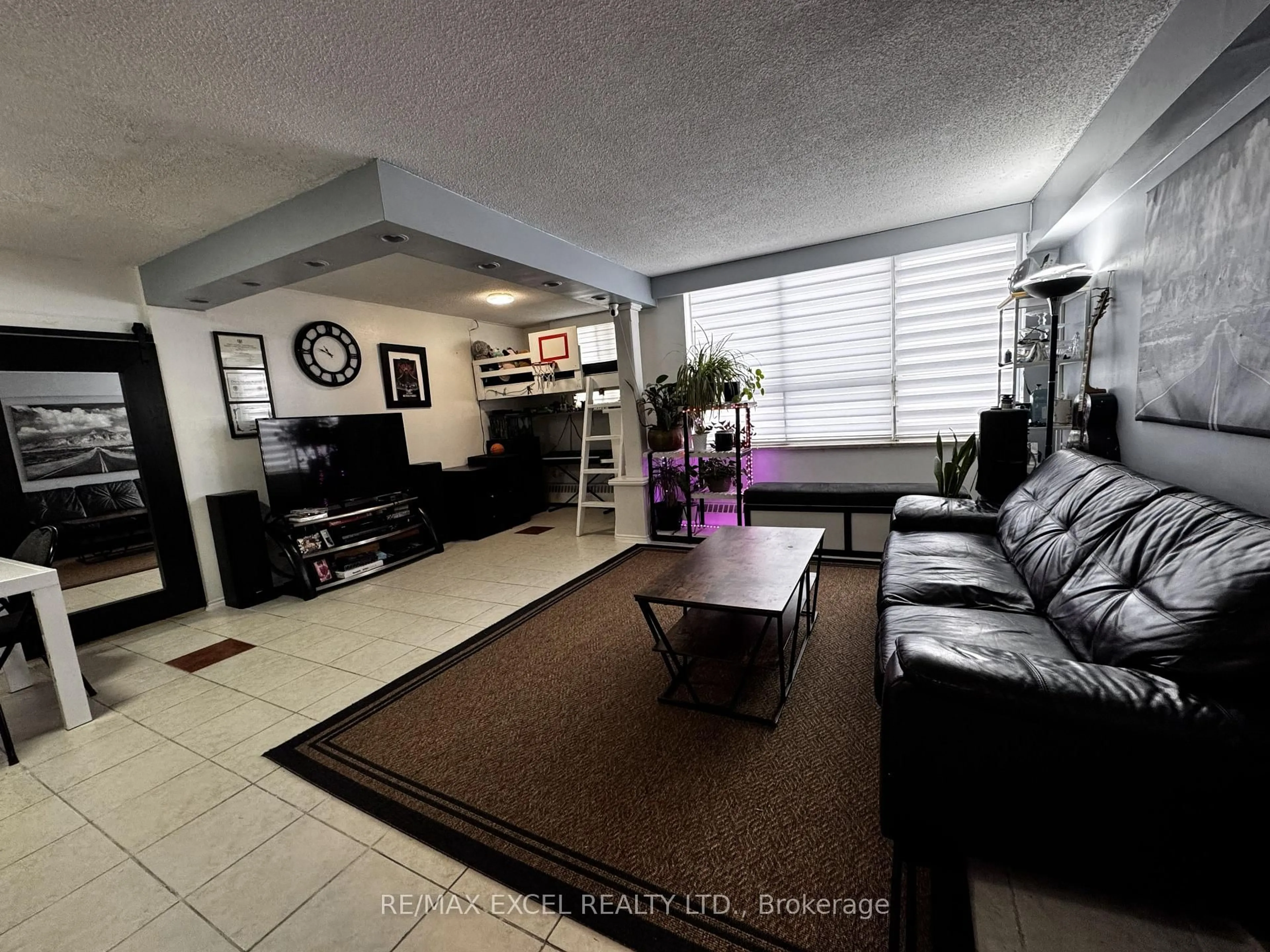 Living room with furniture, unknown for 50 Lotherton Ptwy #308, Toronto Ontario M6B 2G8