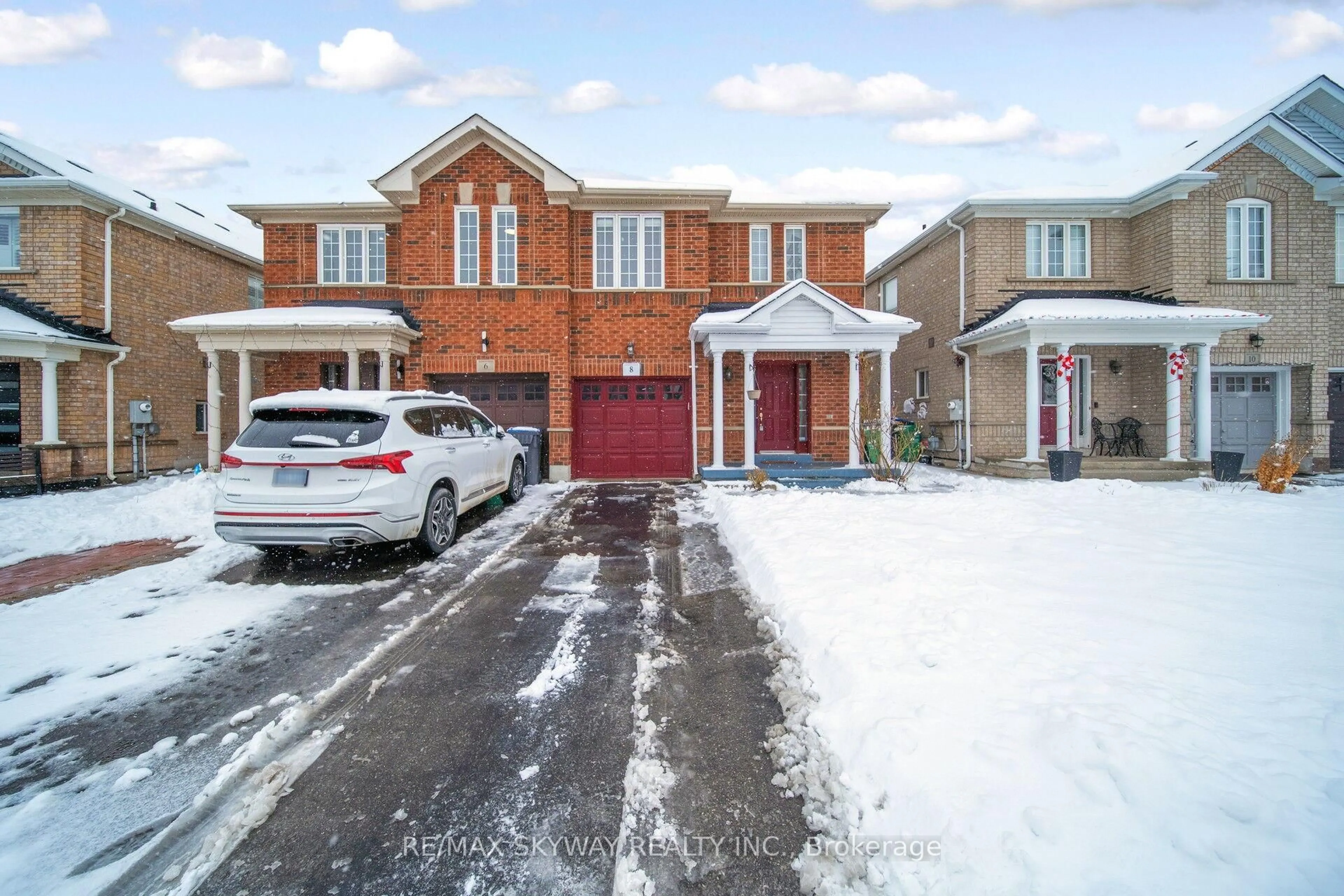 Home with brick exterior material, street for 8 Hollingsworth Circ, Brampton Ontario L7A 0J7