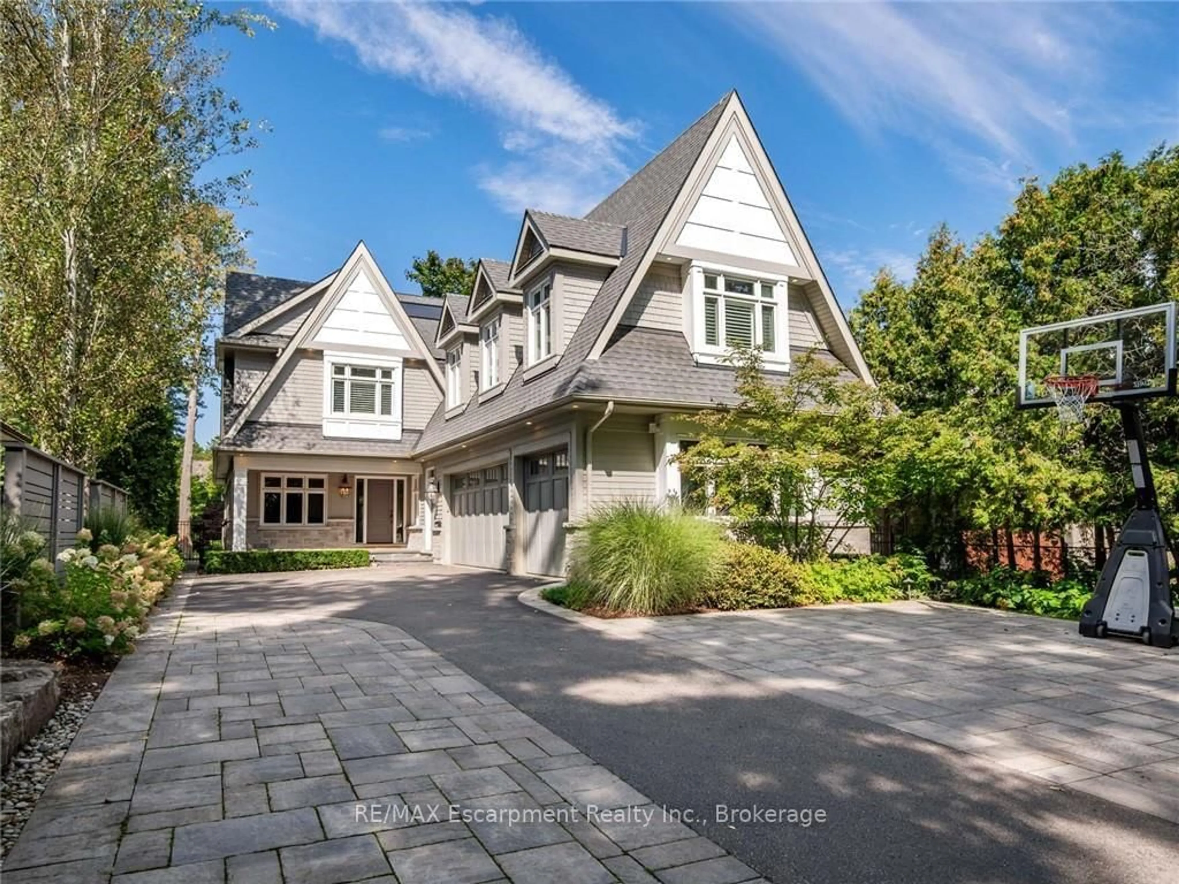 Home with brick exterior material, street for 3087 Lakeshore Rd, Burlington Ontario L7N 1A3