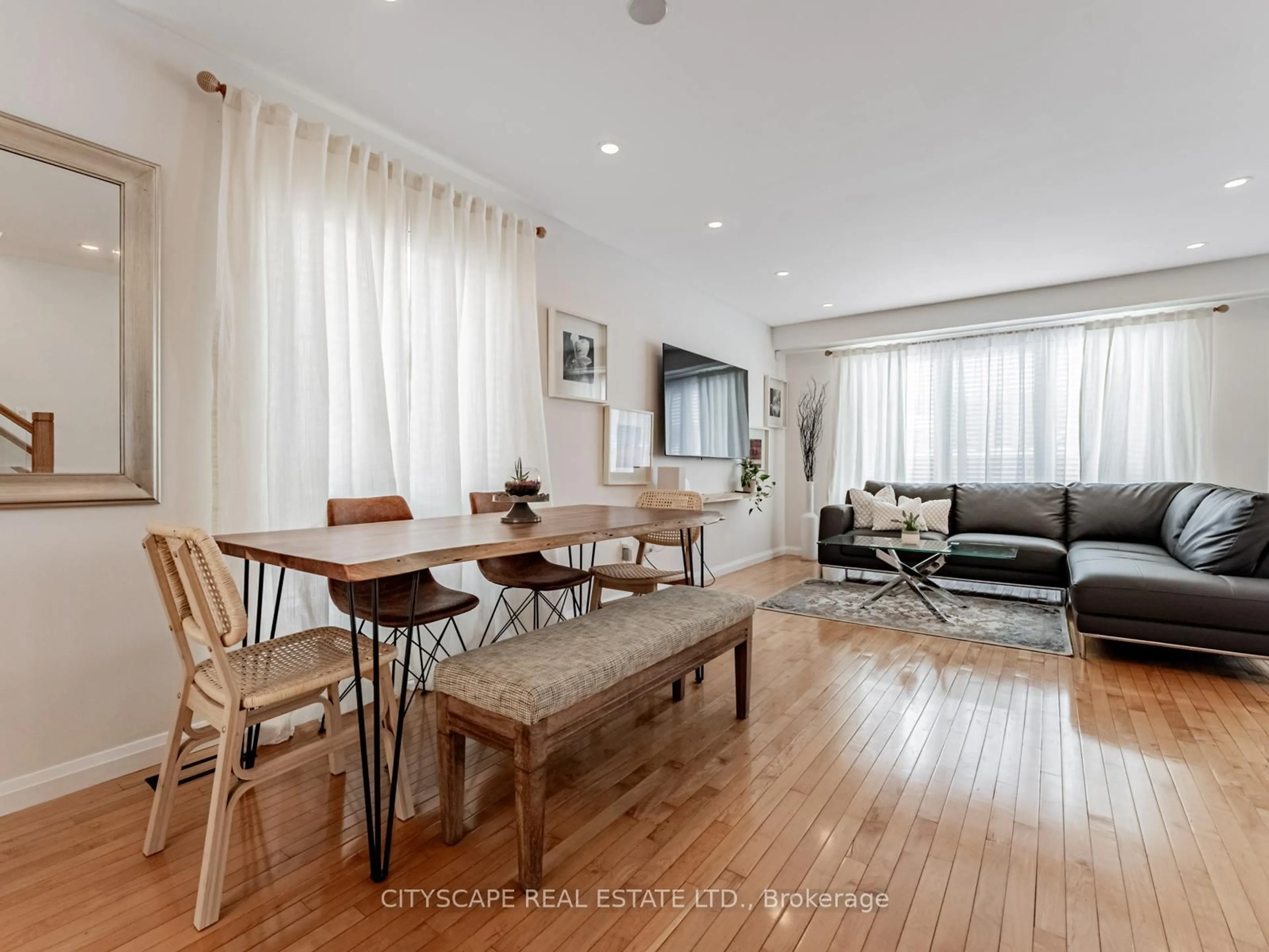 Living room with furniture, wood/laminate floor for 46 Jessop Dr, Brampton Ontario L7A 3M8