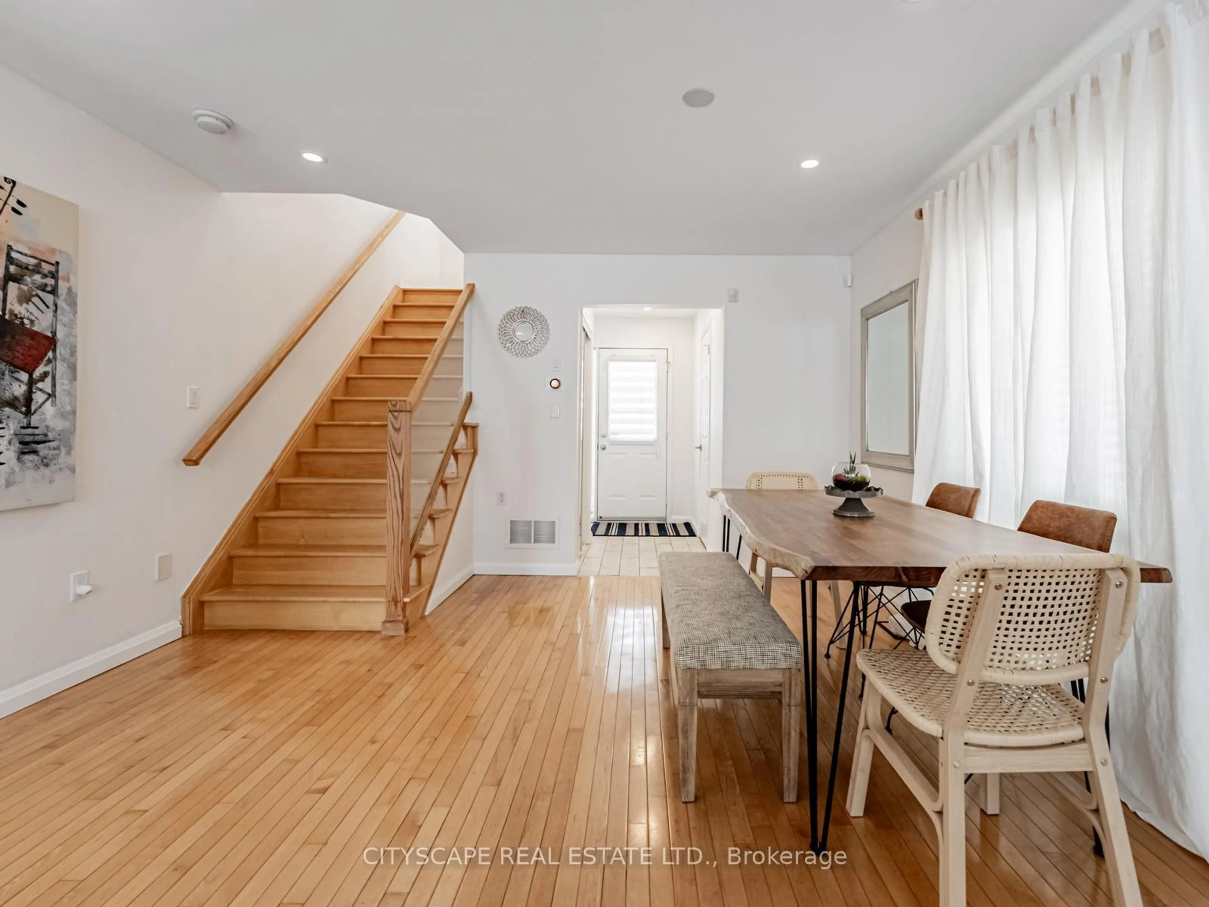 Dining room, wood/laminate floor for 46 Jessop Dr, Brampton Ontario L7A 3M8