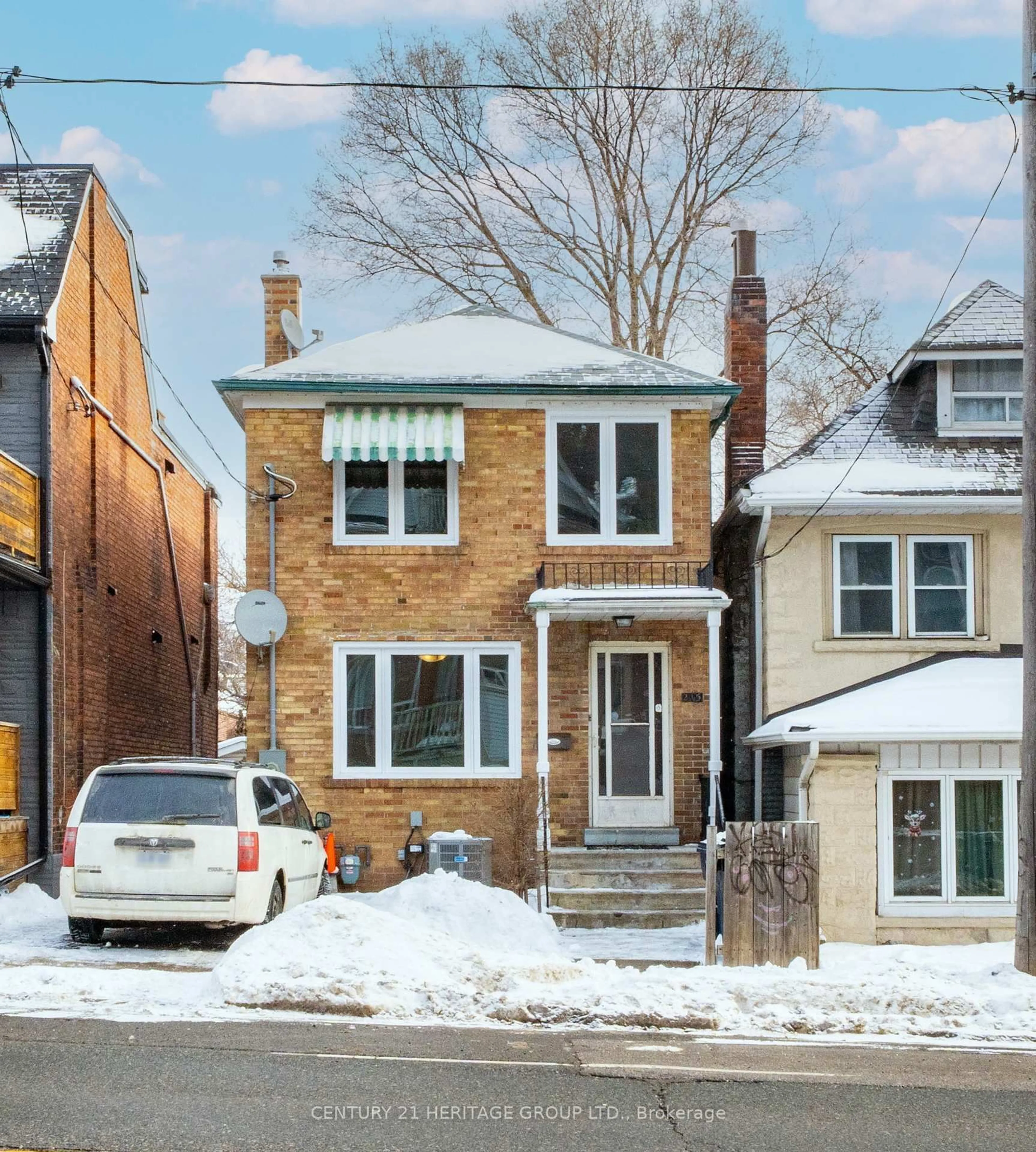 Home with brick exterior material, street for 215 Keele St, Toronto Ontario M6P 2K1