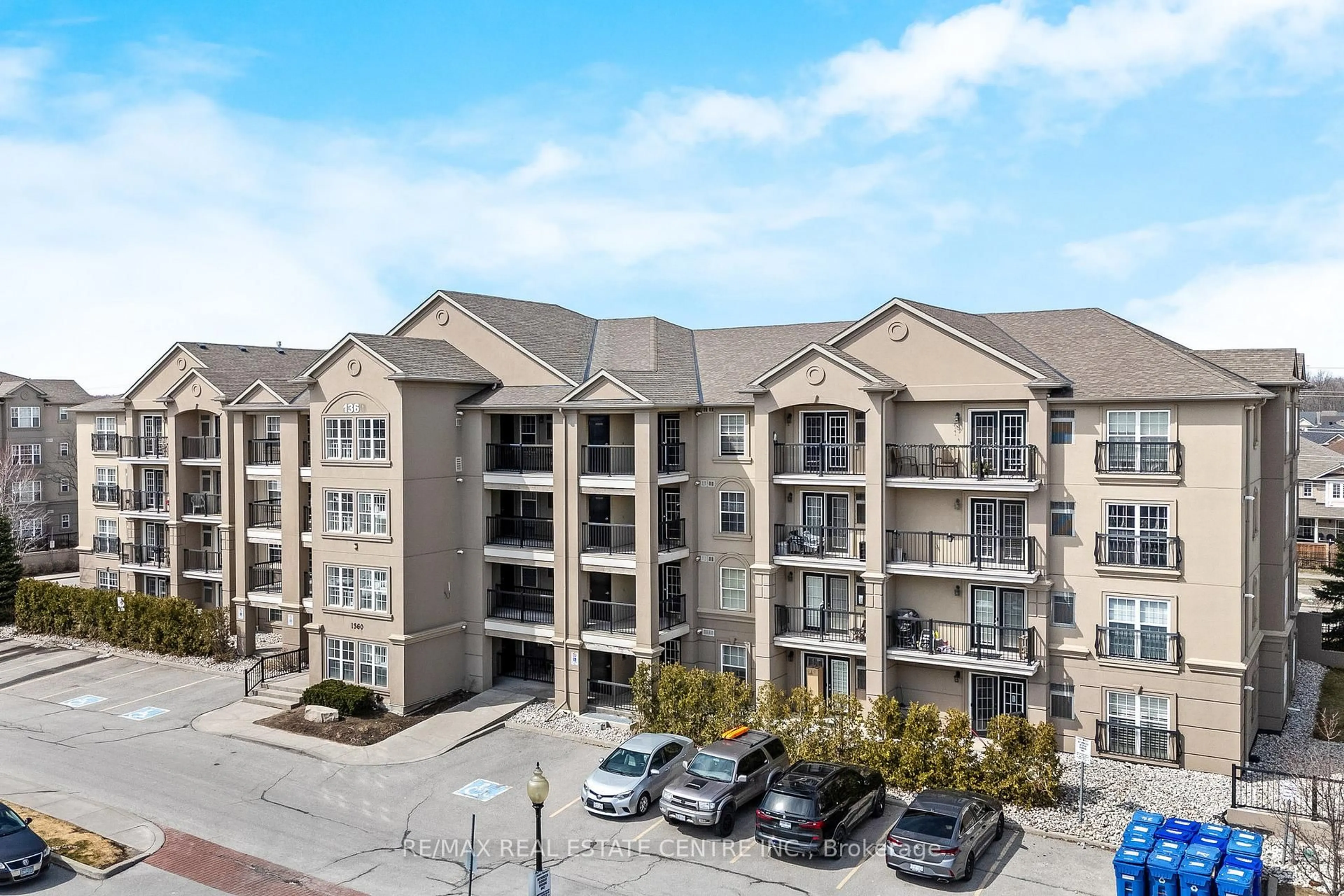 A pic from outside/outdoor area/front of a property/back of a property/a pic from drone, building for 1360 Main St #304, Milton Ontario L9T 7S5