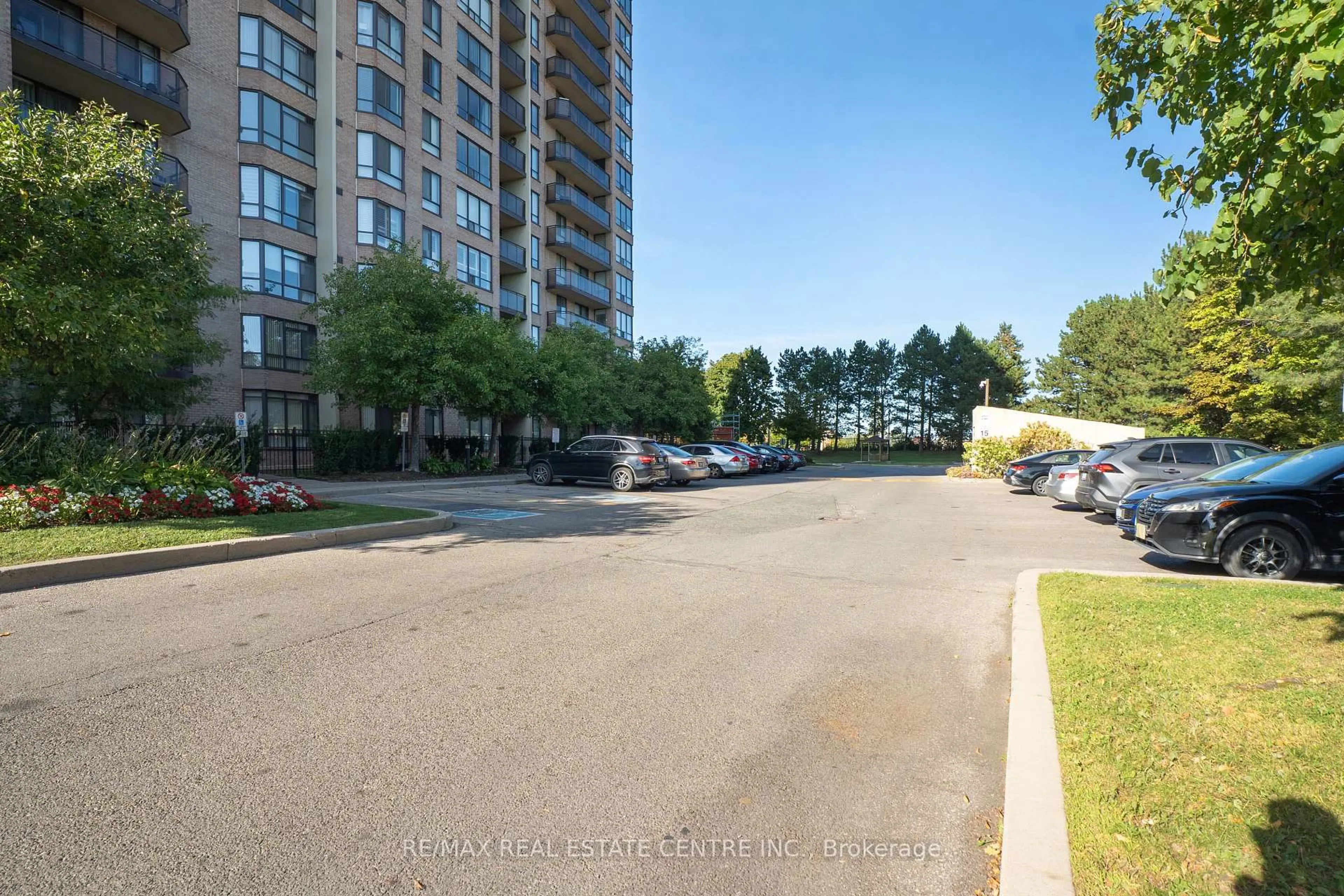 A pic from outside/outdoor area/front of a property/back of a property/a pic from drone, street for 20 Cherrytree Dr #802, Brampton Ontario L6Y 3V1