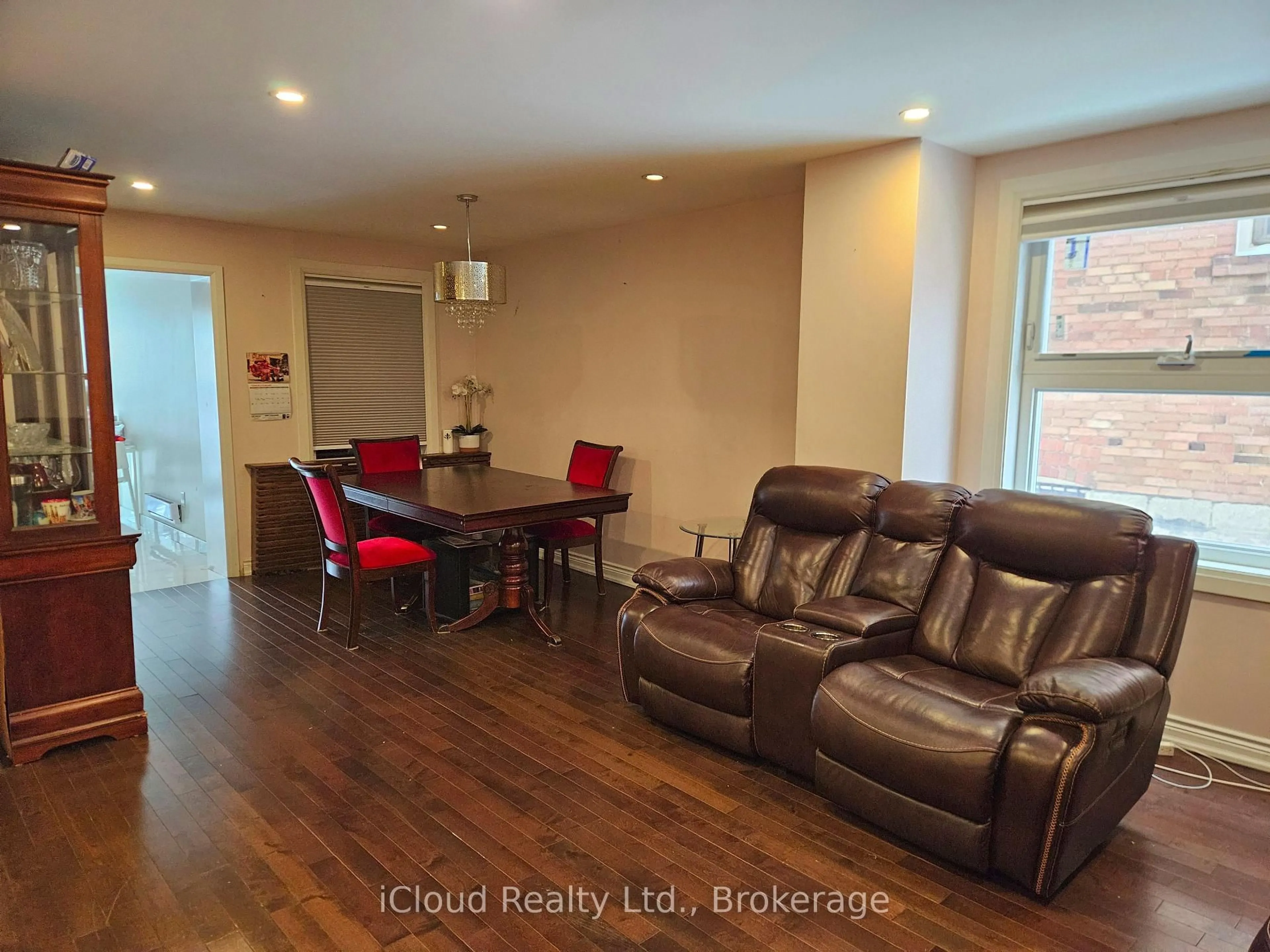 Living room with furniture, wood/laminate floor for 104 McRoberts Ave, Toronto Ontario M6E 4P5