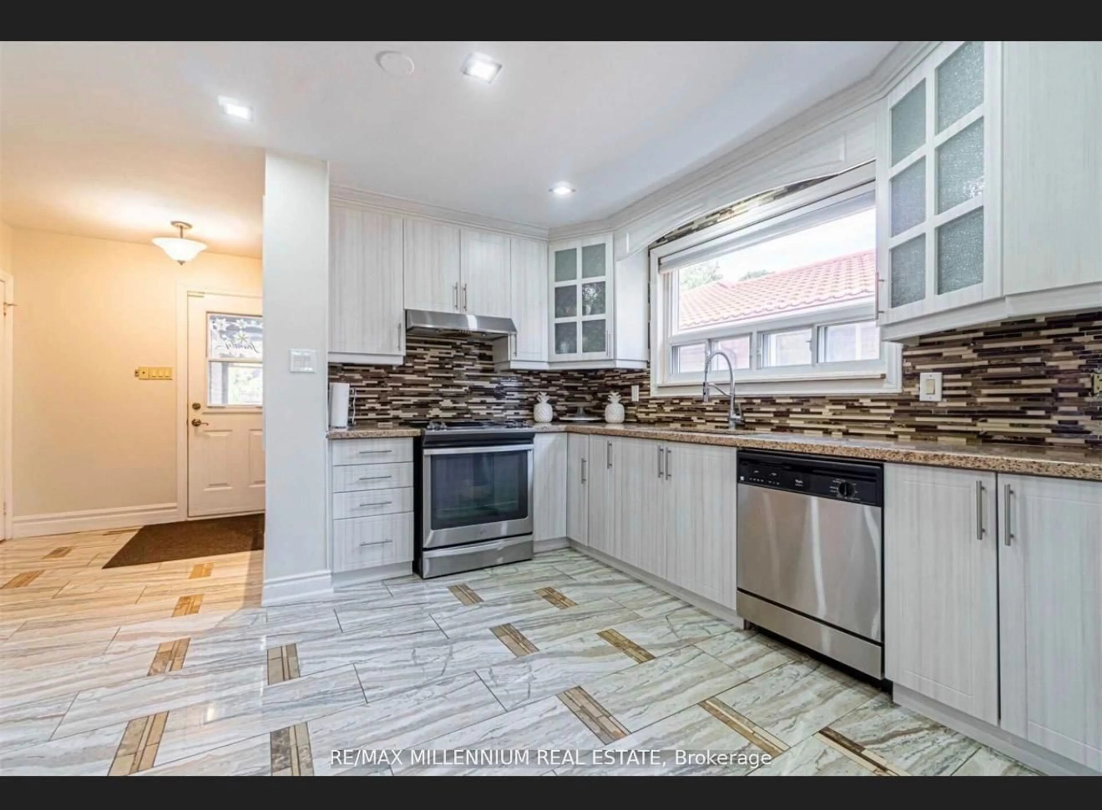 Open concept kitchen, ceramic/tile floor for 84 Dorset Dr, Brampton Ontario L6T 2Y9