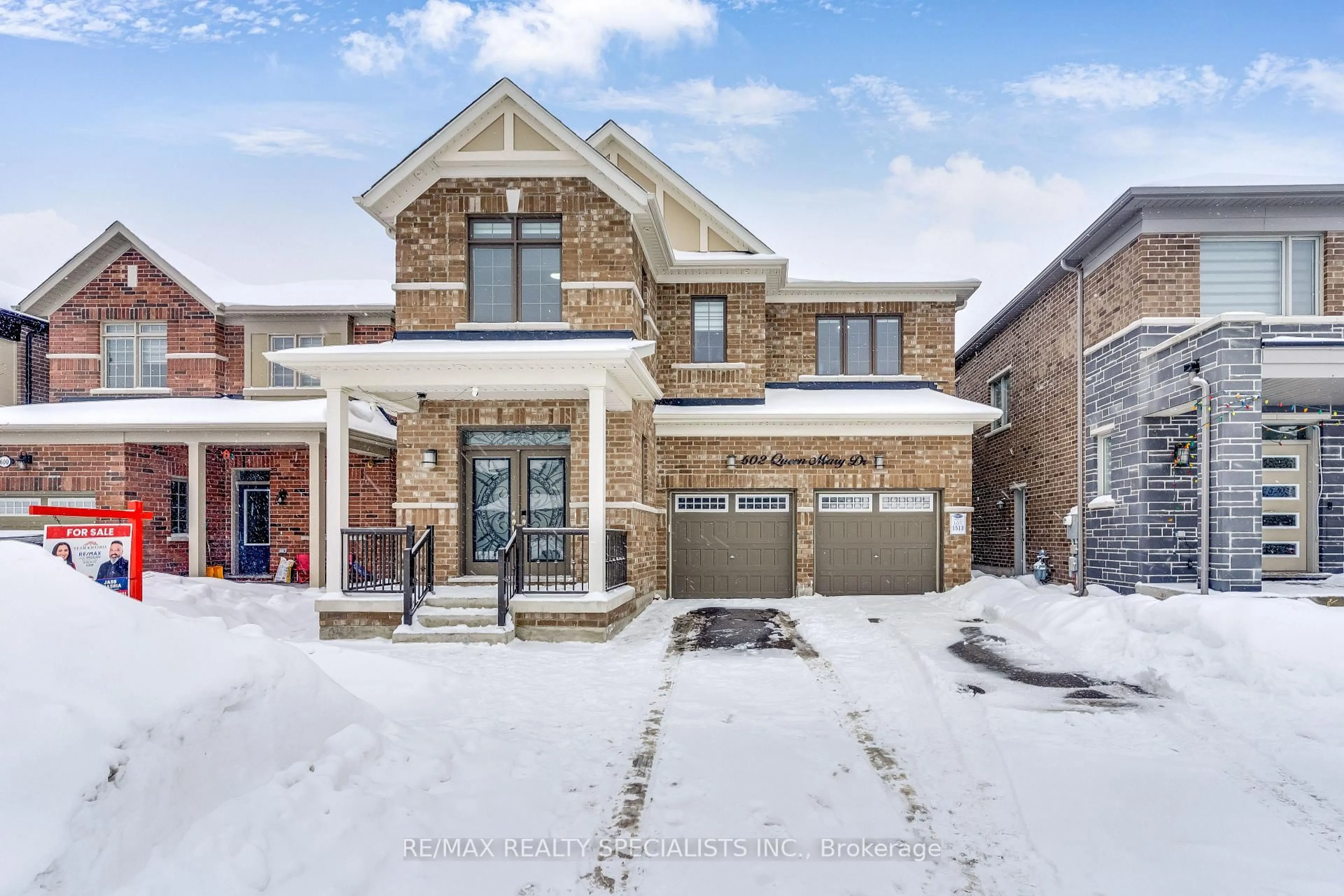 Home with brick exterior material, street for 602 Queen Mary Dr, Brampton Ontario L7A 5H4