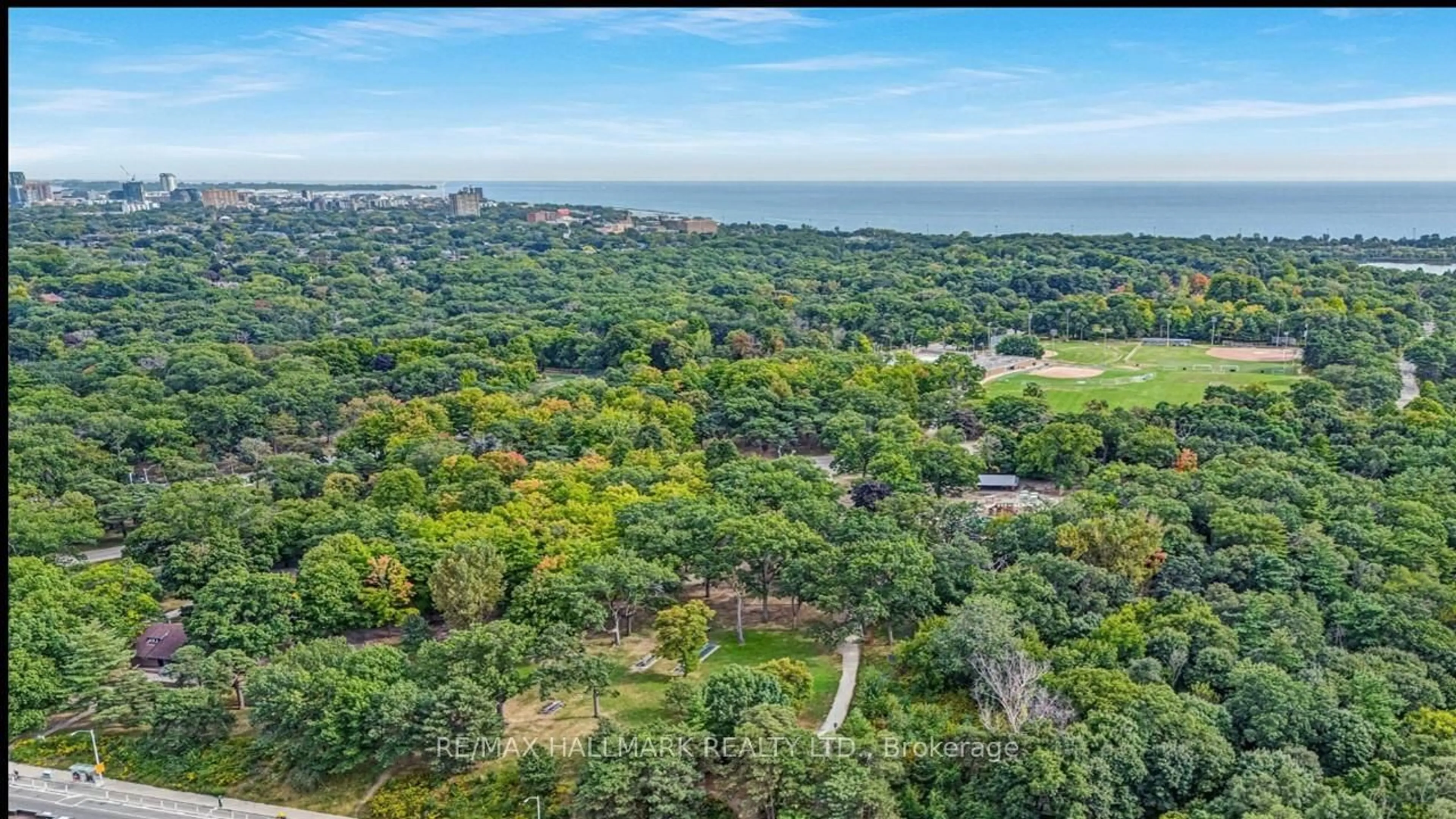 A pic from outside/outdoor area/front of a property/back of a property/a pic from drone, forest/trees view for 20 Gothic Ave #201, Toronto Ontario M6P 1T5