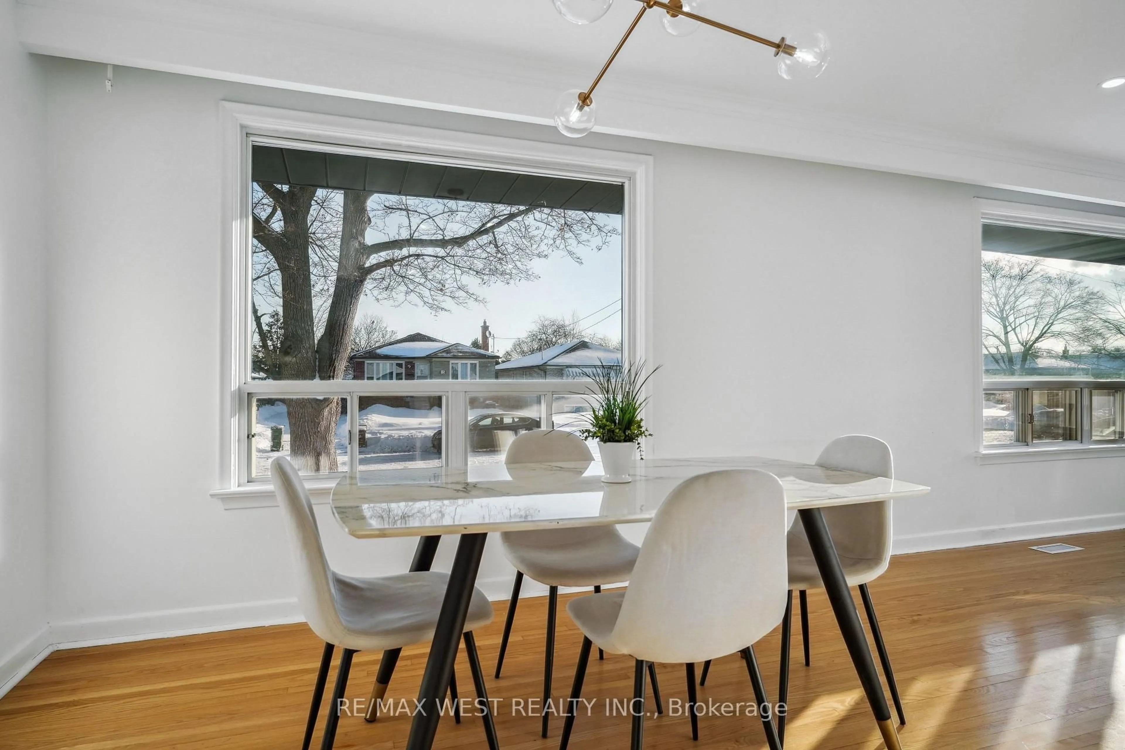 Dining room, wood/laminate floor for 14 ixworth Rd, Toronto Ontario M9W 4R8