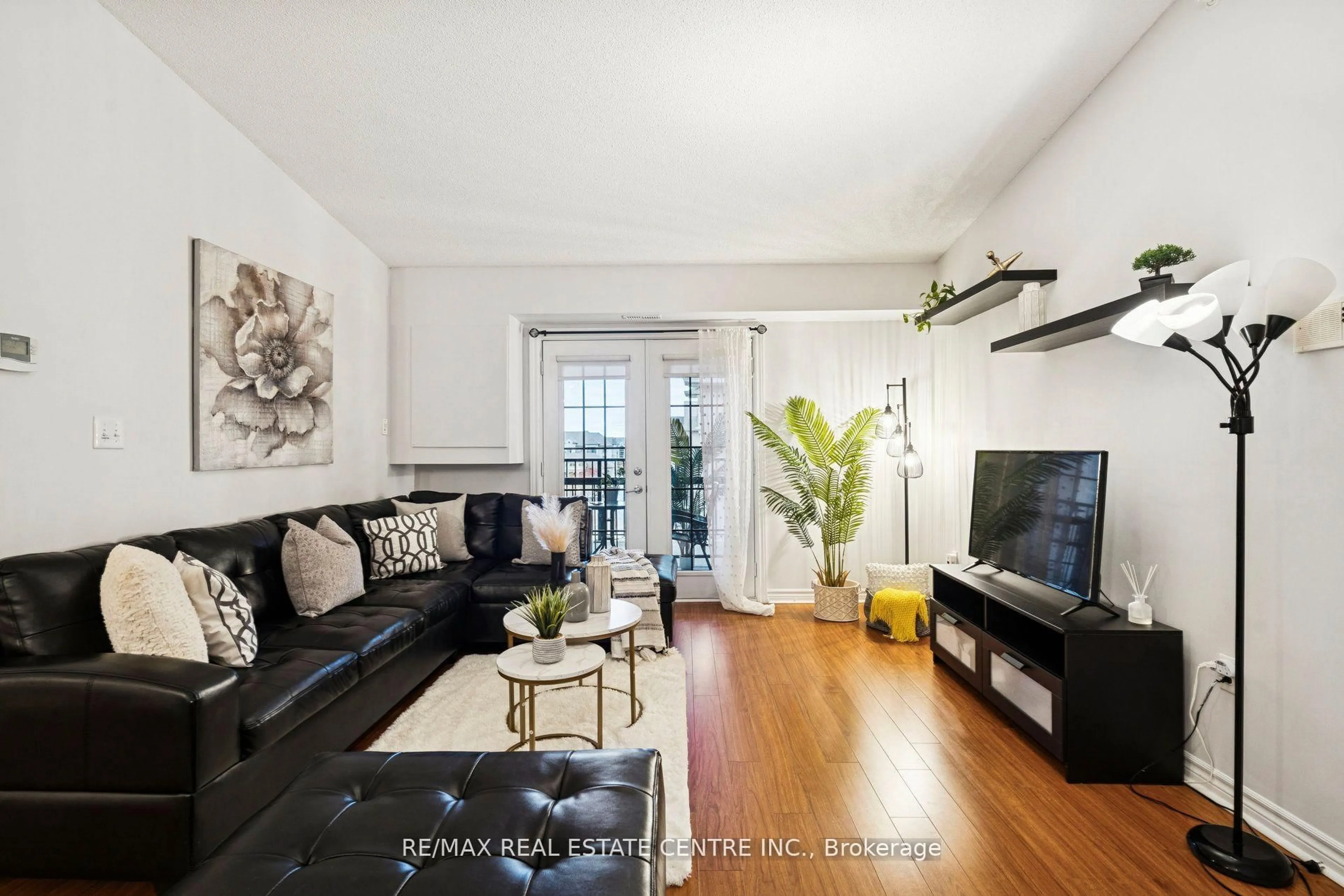 Living room with furniture, unknown for 1350 Main St #408, Milton Ontario L9T 7S7