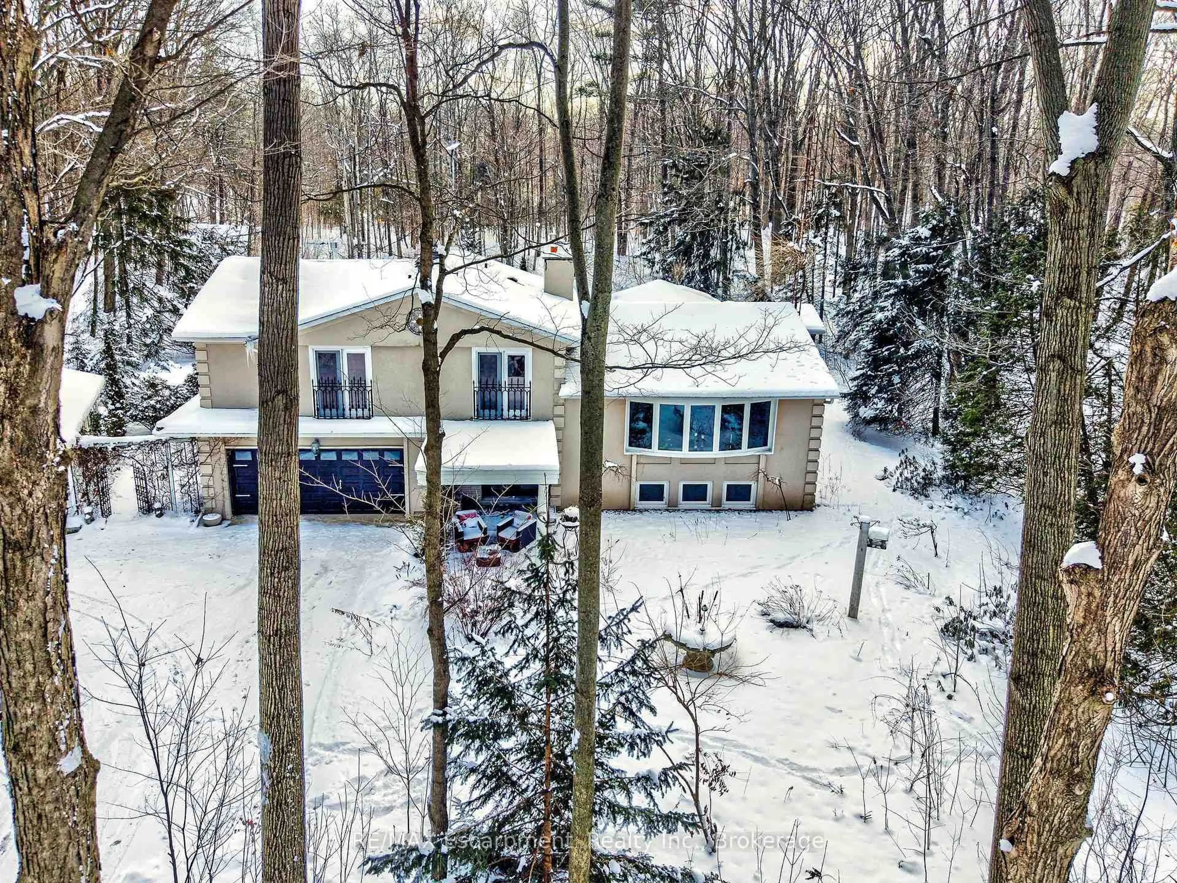 A pic from outside/outdoor area/front of a property/back of a property/a pic from drone, forest/trees view for 1158 Conservation Rd, Milton Ontario L0P 1B0