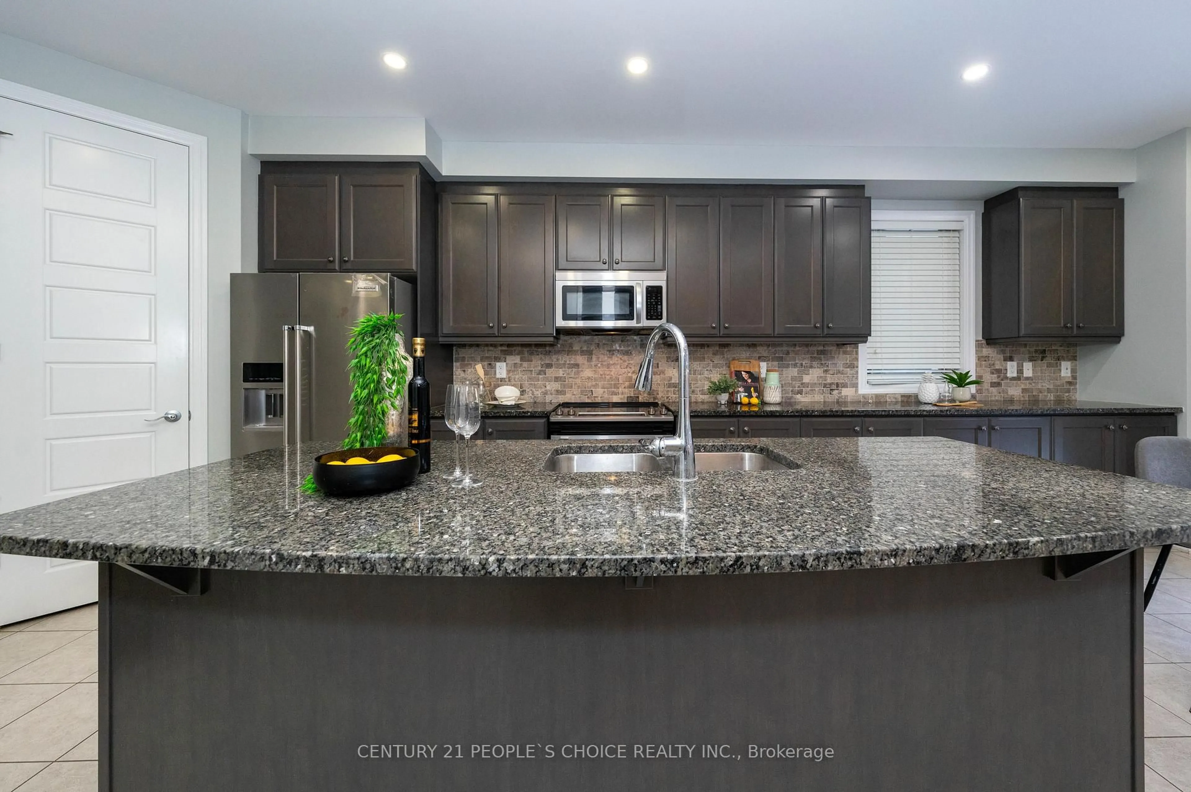 Open concept kitchen, ceramic/tile floor for 381 Dahlia Tr, Oakville Ontario L6M 1L4