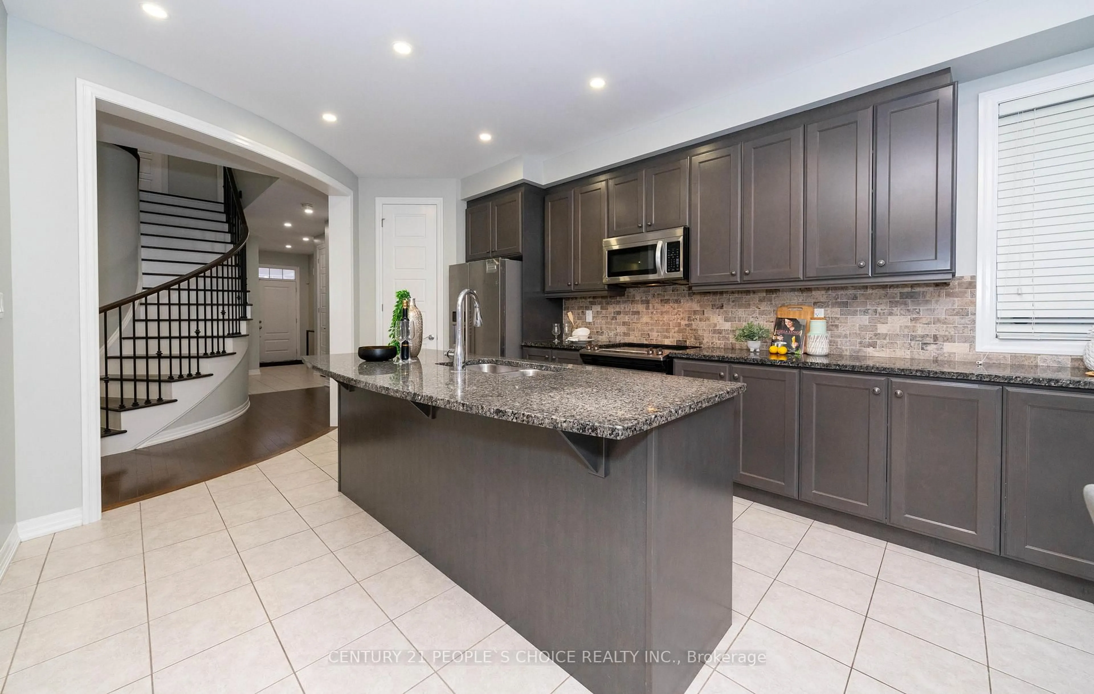 Open concept kitchen, ceramic/tile floor for 381 Dahlia Tr, Oakville Ontario L6M 1L4