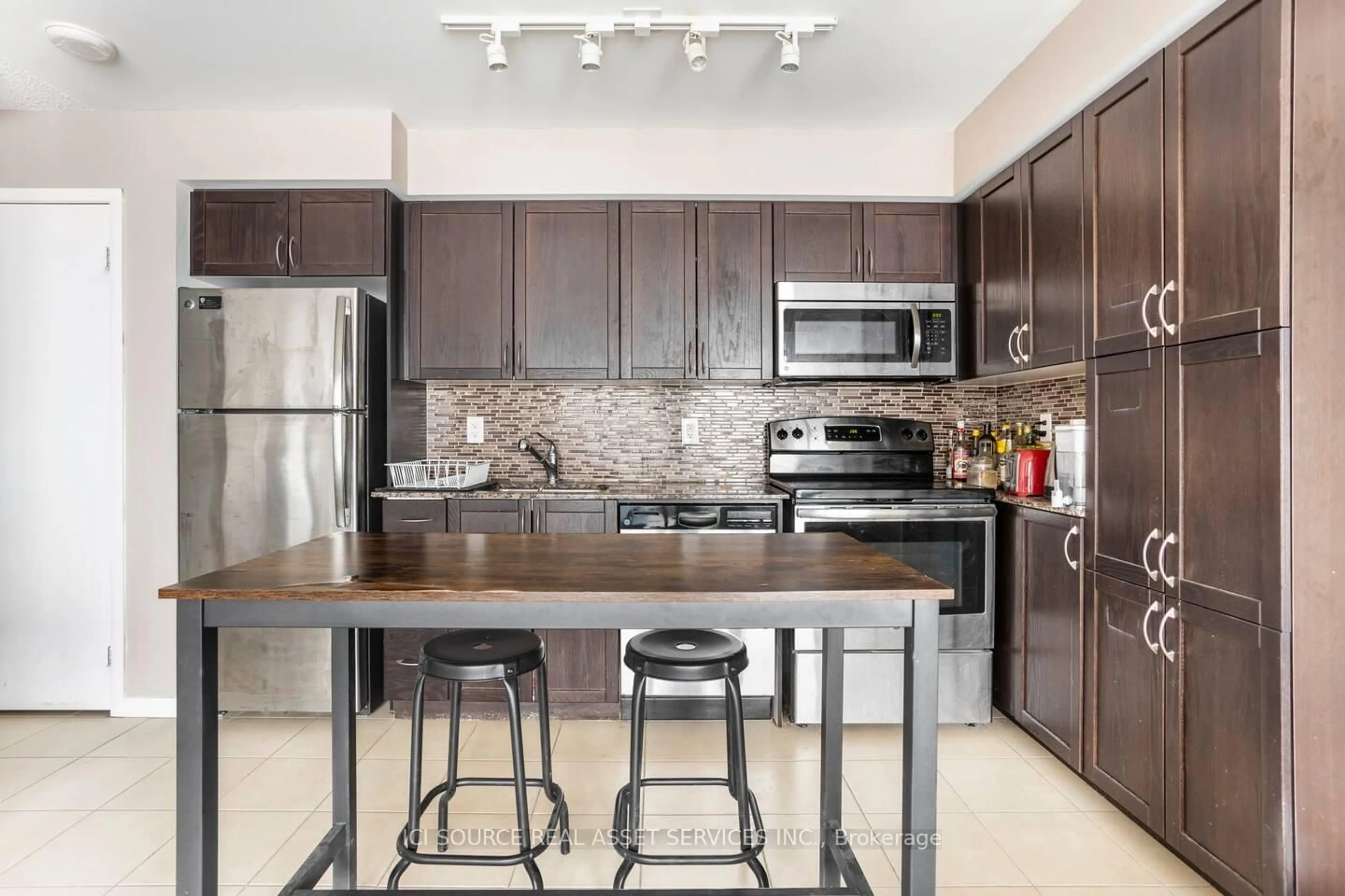 Open concept kitchen, ceramic/tile floor for 830 Lawrence Ave #1904, Toronto Ontario M6A 0B6