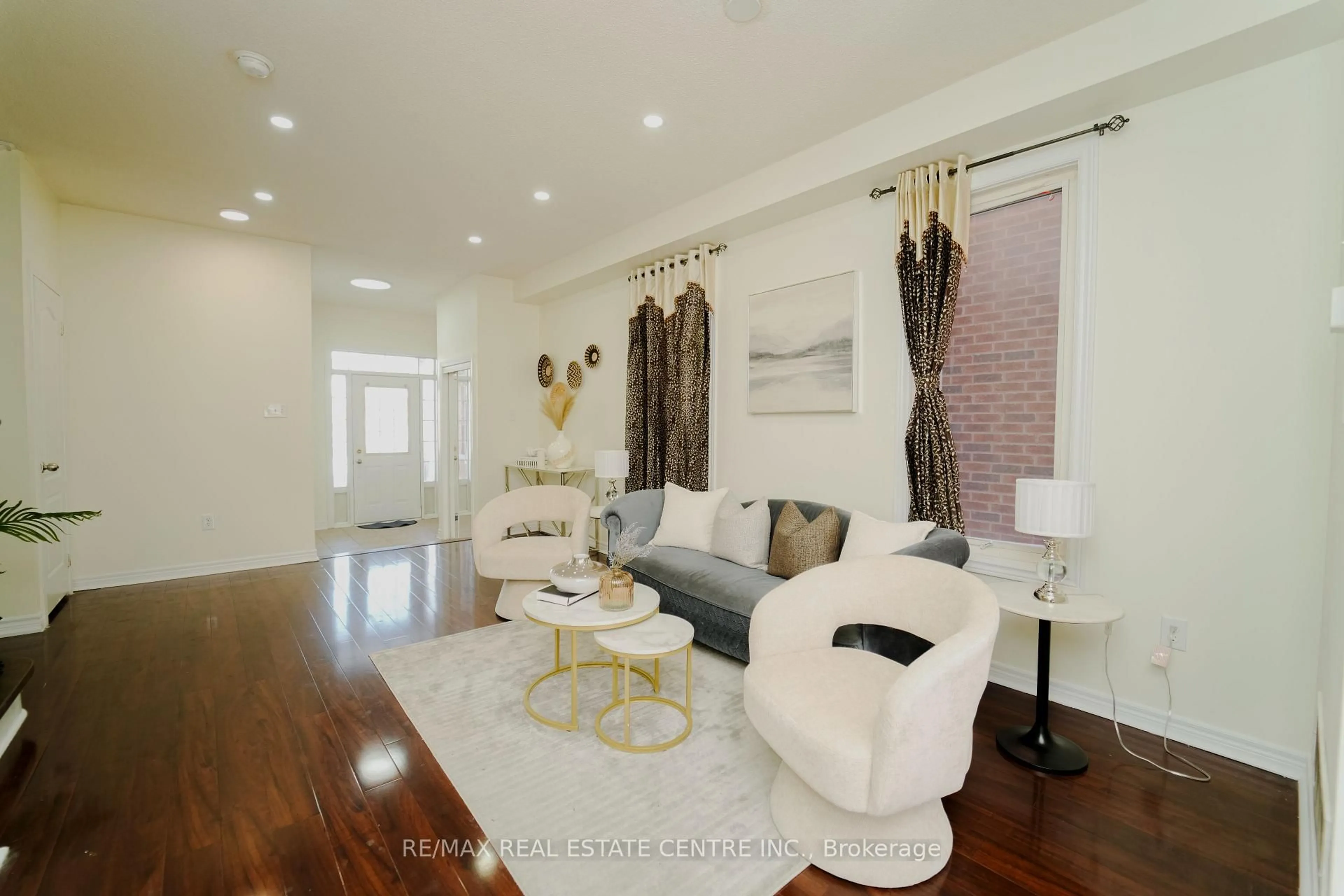 Living room with furniture, unknown for 133 Seahorse Ave, Brampton Ontario L6V 4N5