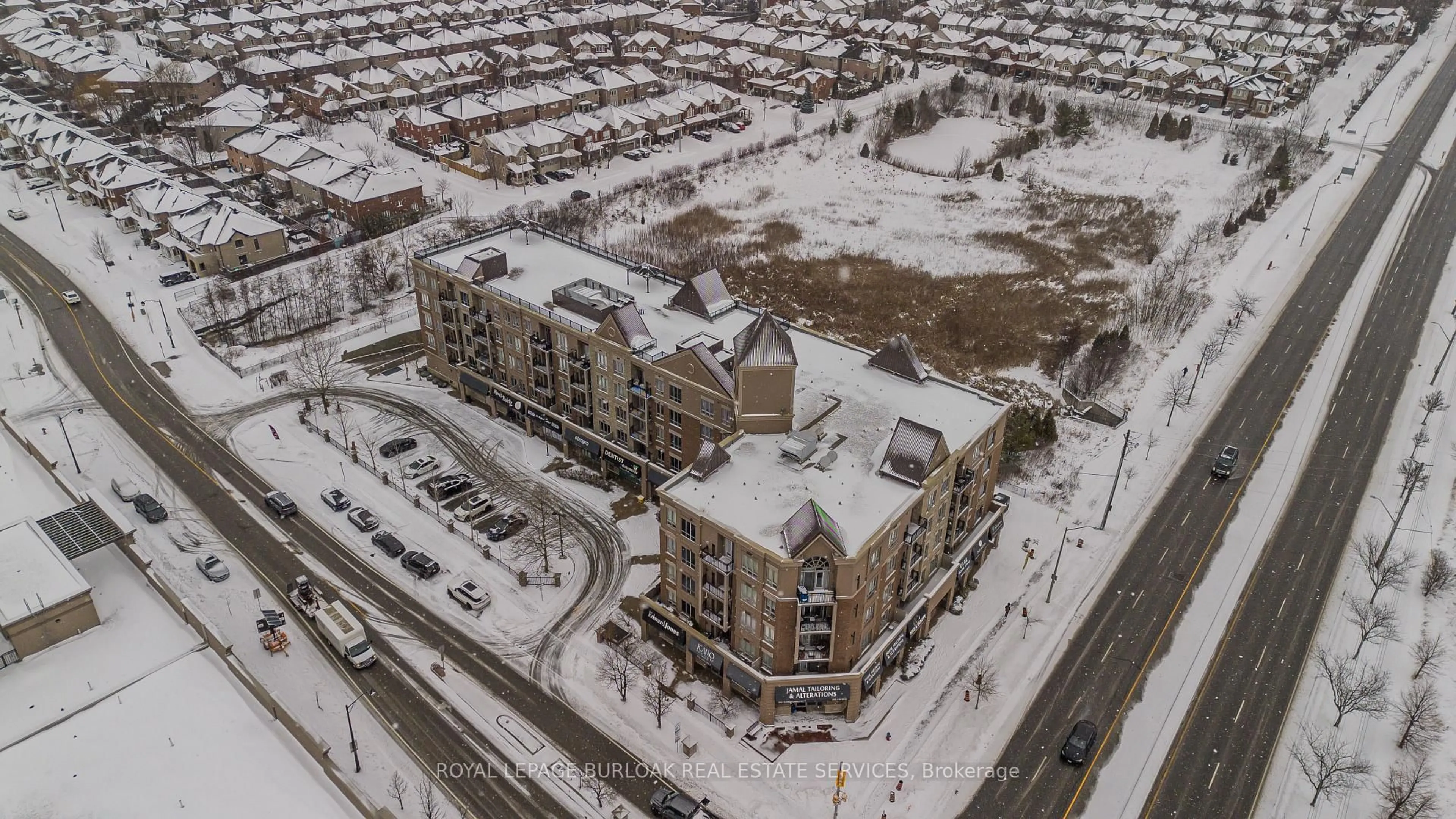 A pic from outside/outdoor area/front of a property/back of a property/a pic from drone, unknown for 5327 Upper Middle Rd #205, Burlington Ontario L7L 0E9