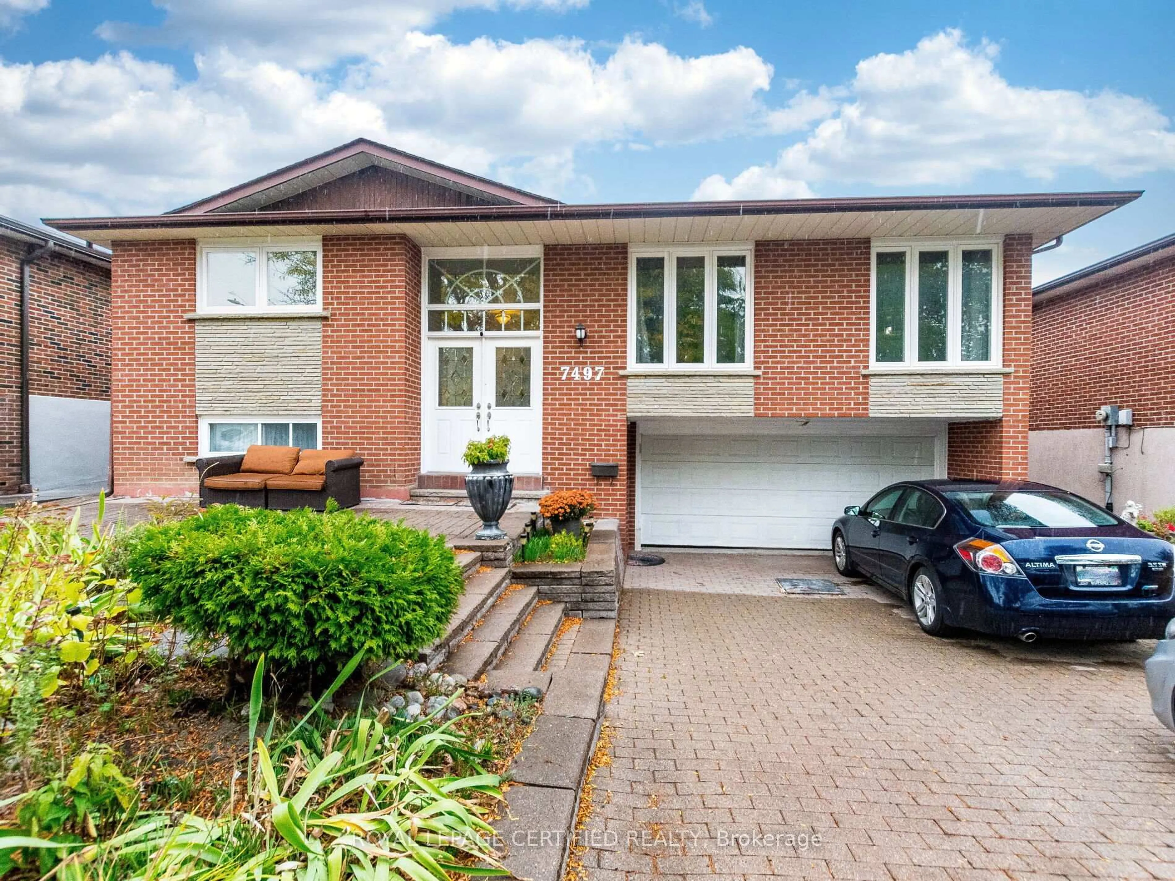 Home with brick exterior material, street for 7497 Middleshire Dr, Mississauga Ontario L4T 3S3