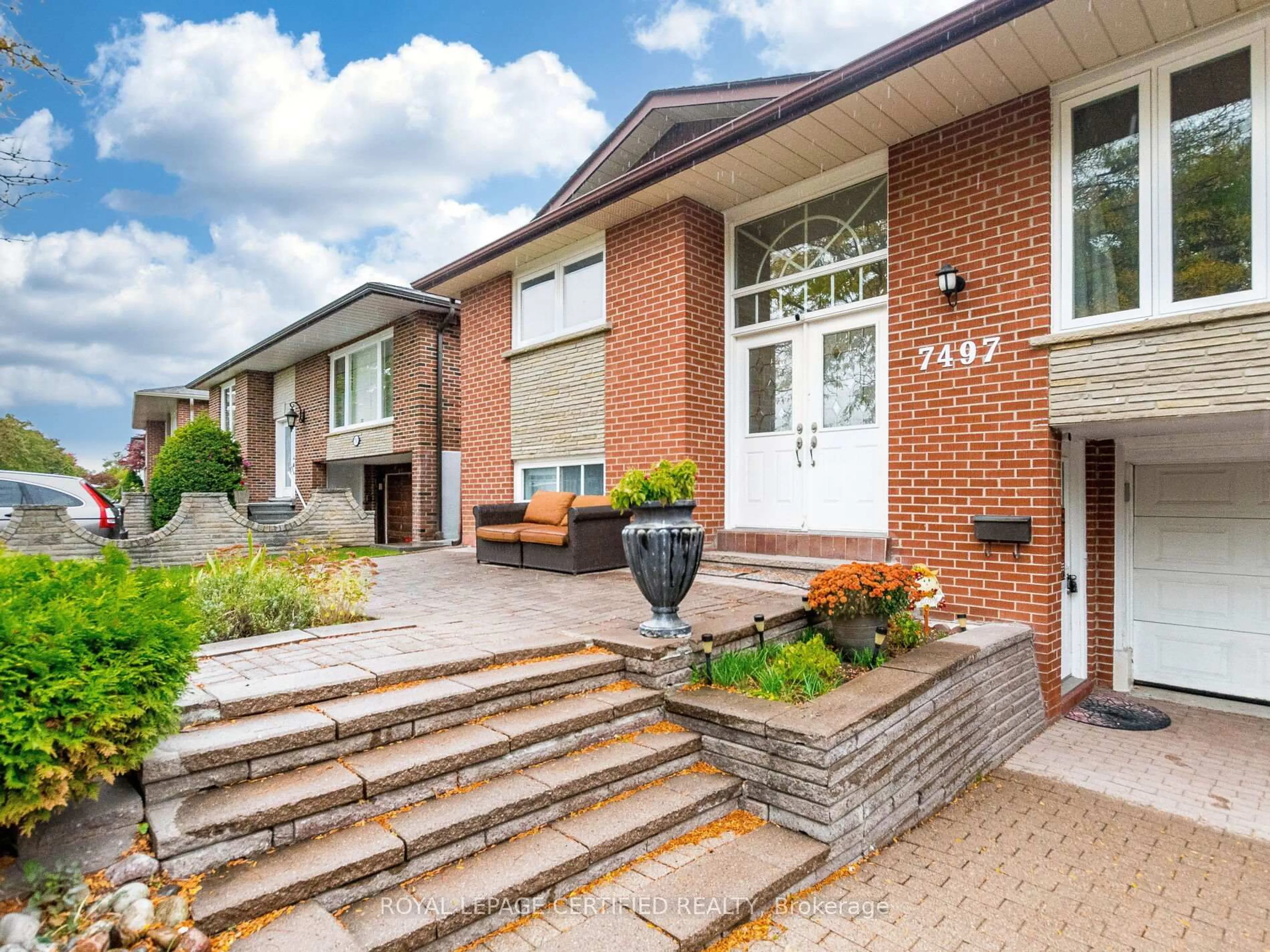 Home with brick exterior material, street for 7497 Middleshire Dr, Mississauga Ontario L4T 3S3