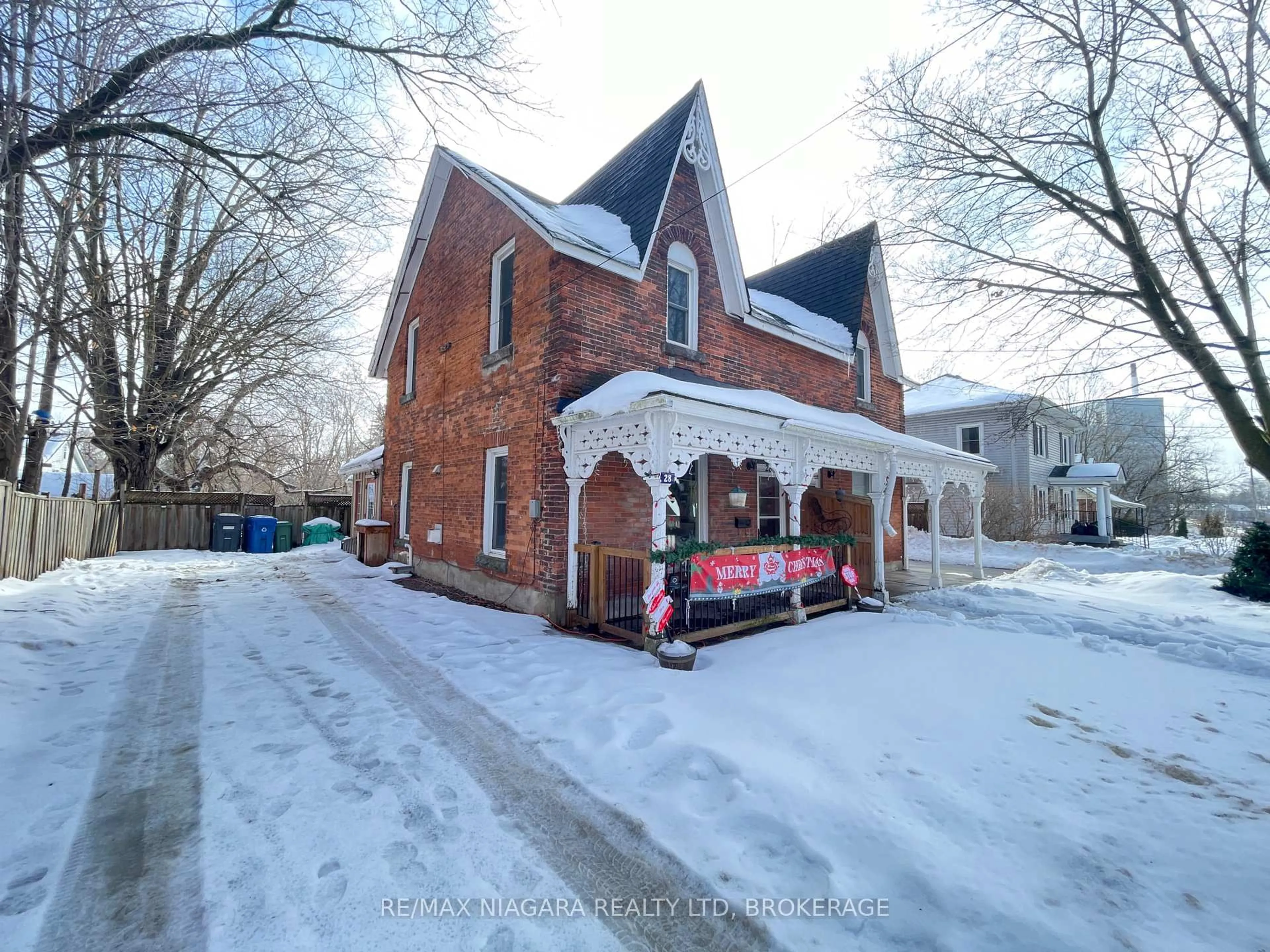 Home with brick exterior material, street for 30 Mill St, Halton Hills Ontario L7J 1G4
