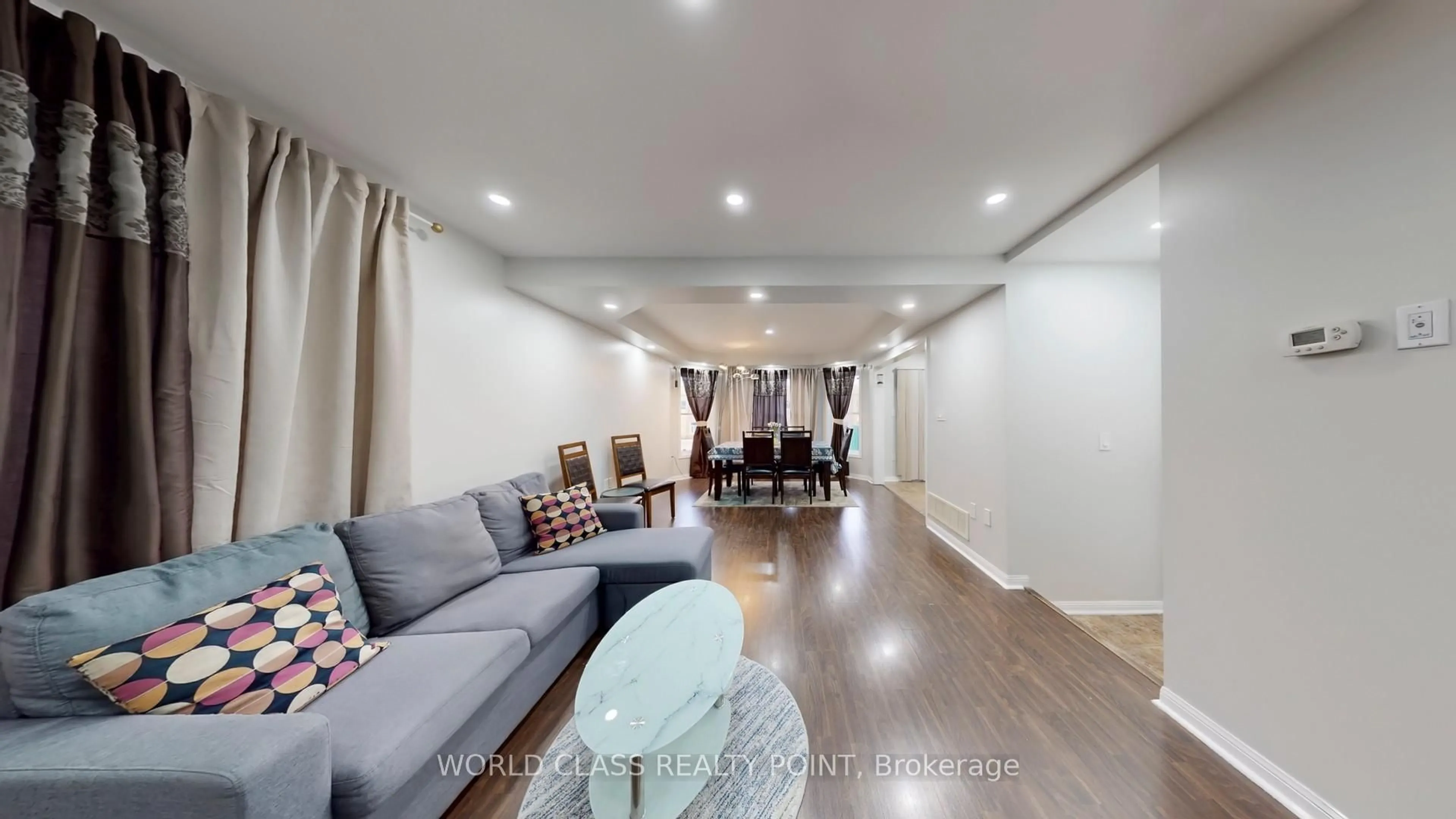 Living room with furniture, wood/laminate floor for 382 Pringle Ave, Milton Ontario L9T 7M4