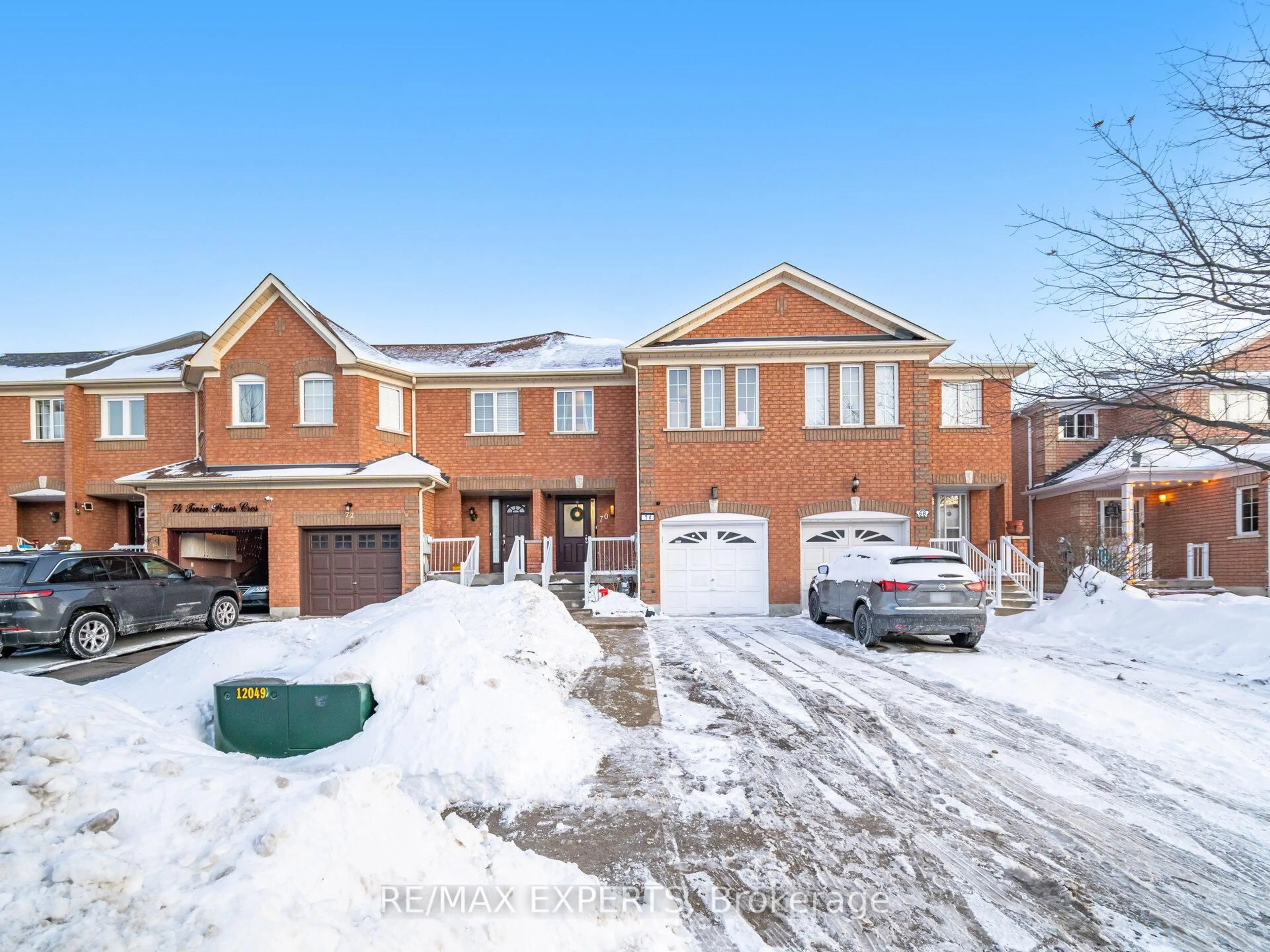 Home with brick exterior material, street for 70 Twin Pines Cres, Brampton Ontario L7A 1M8
