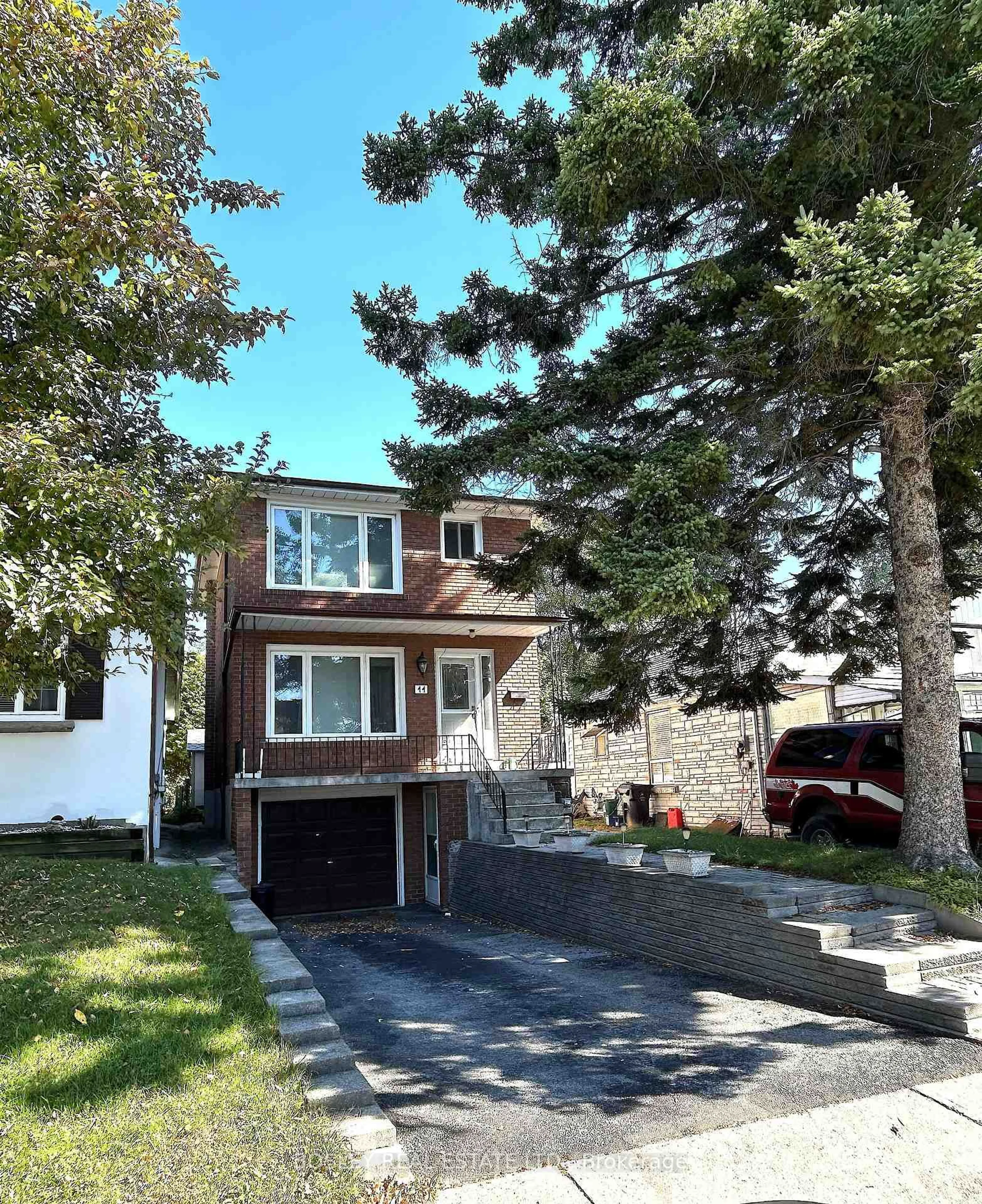 Home with vinyl exterior material, street for 11 Forty First St, Toronto Ontario M8W 3N4