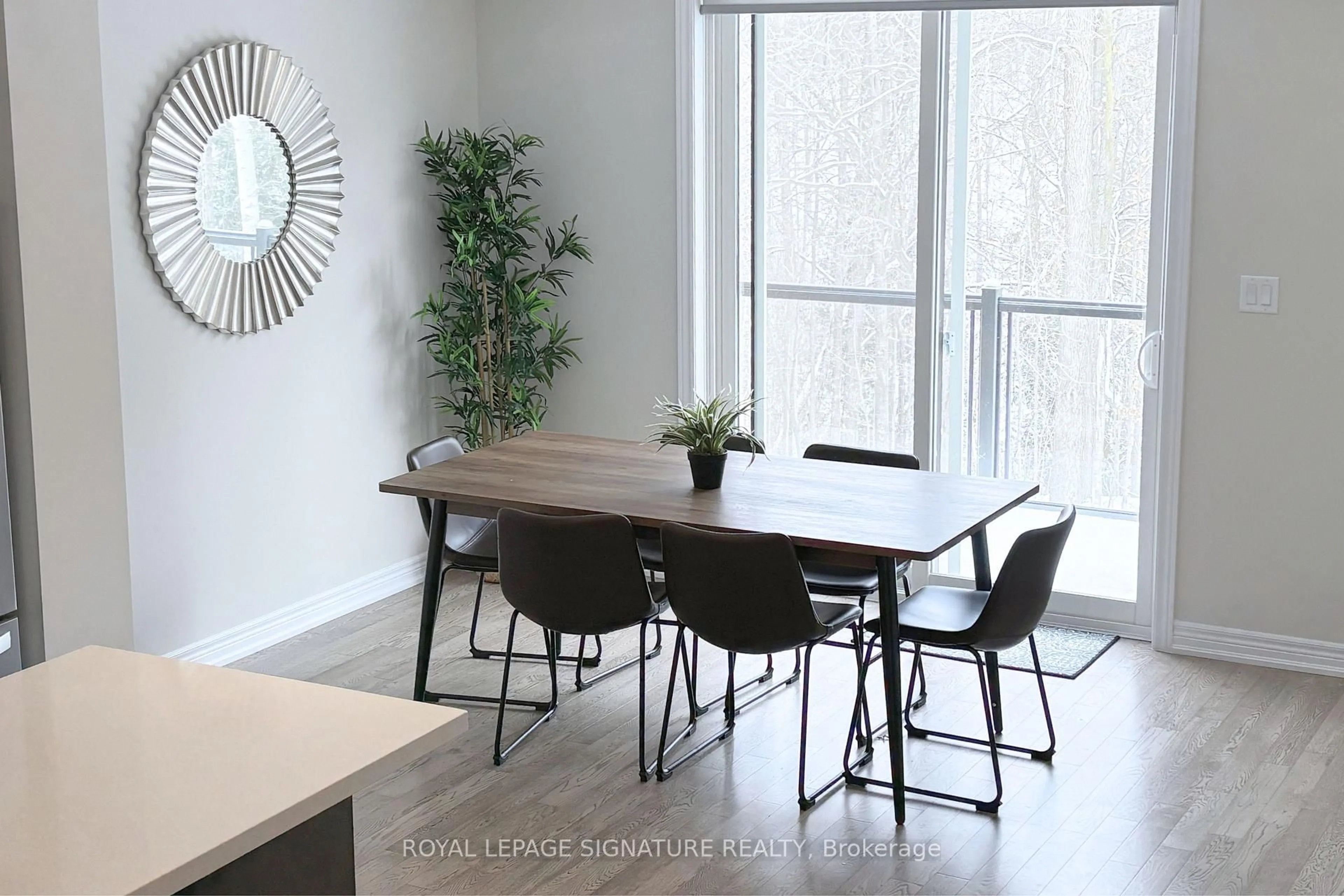 Dining room, wood/laminate floor for 63 Folcroft St, Brampton Ontario L6Y 0B6