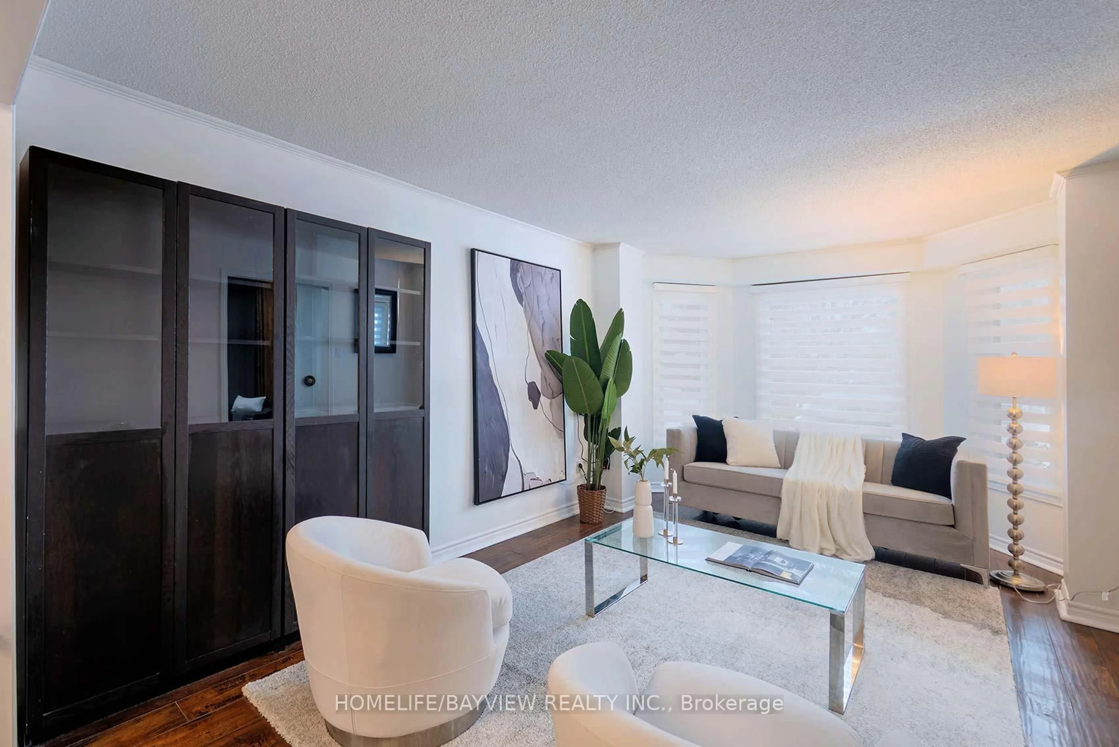 Living room with furniture, wood/laminate floor for 55 Richvale Dr, Brampton Ontario L6Z 1M3