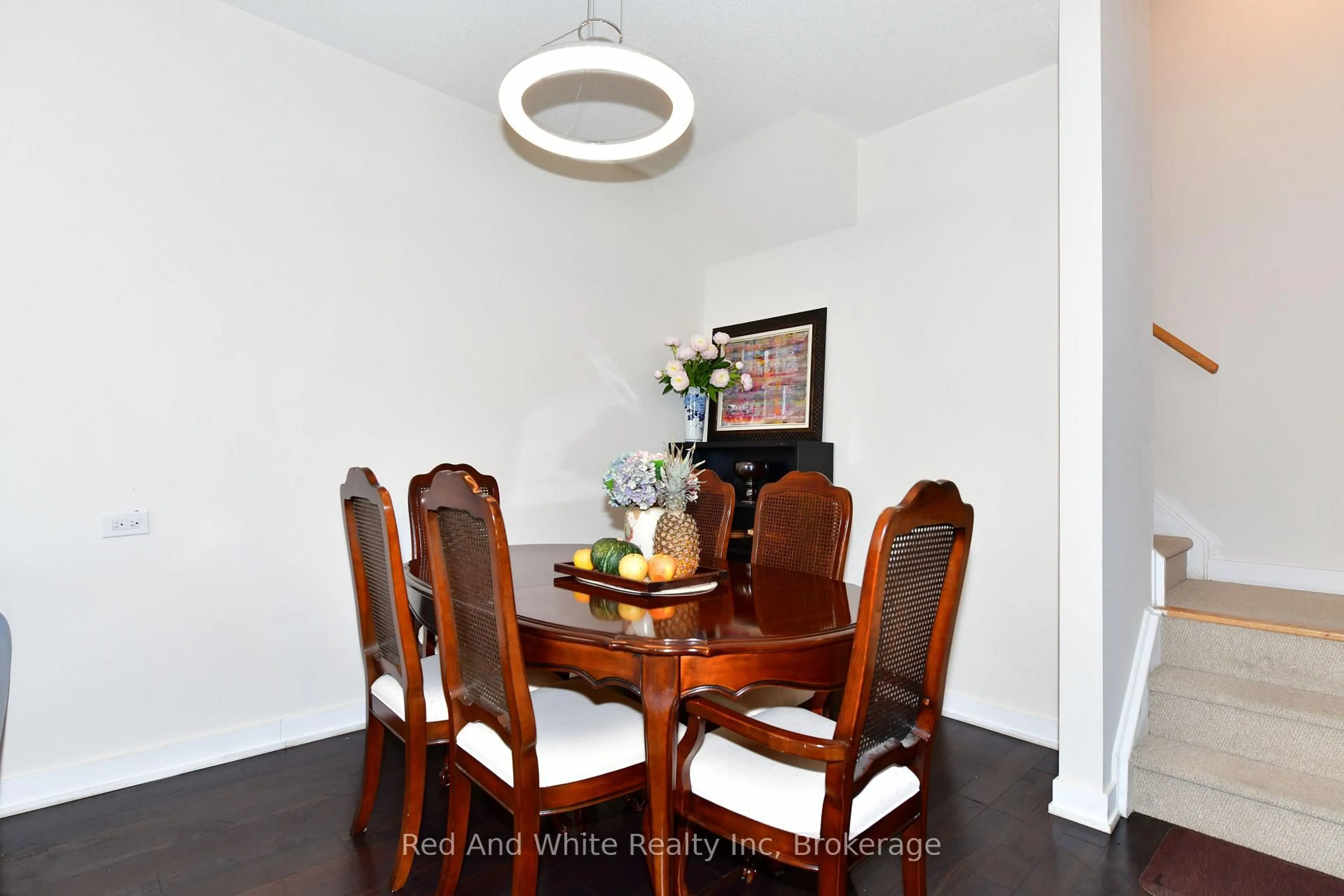 Dining room, wood/laminate floor for 4080 Parkside Village Dr #3, Mississauga Ontario L5B 0K2