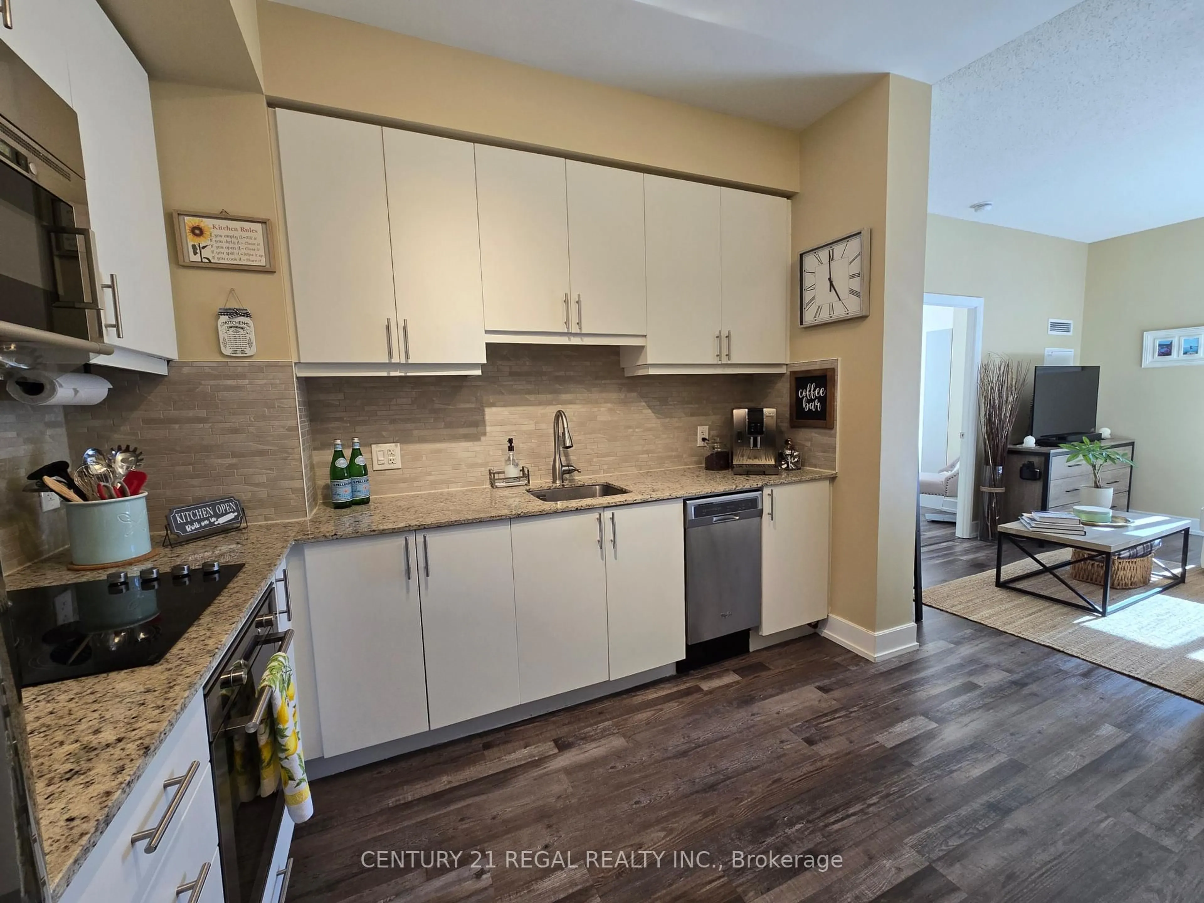 Open concept kitchen, unknown for 2 Eva Rd #229, Toronto Ontario M9C 0A9